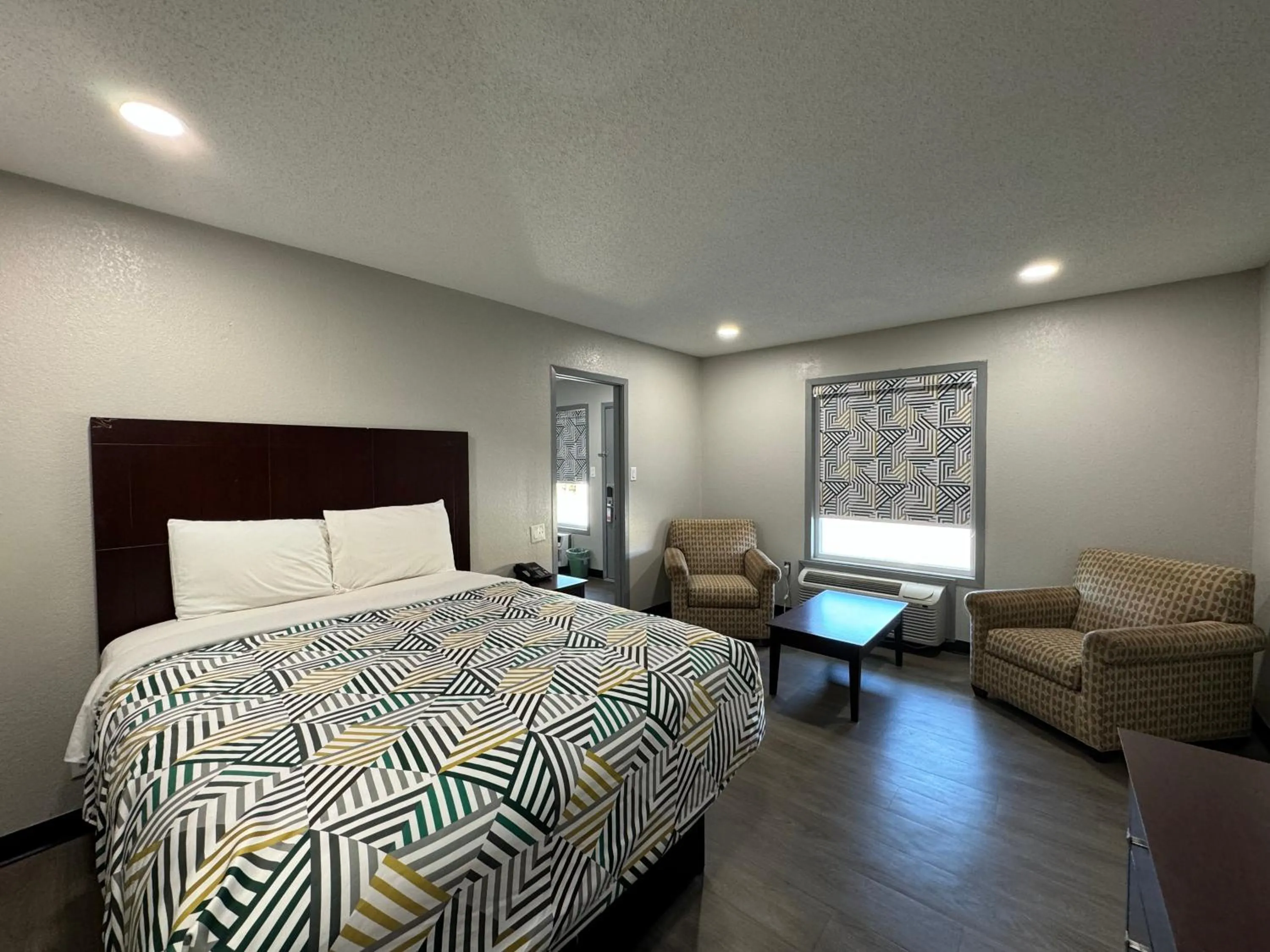 Bed in Relax Inn Mcgehee