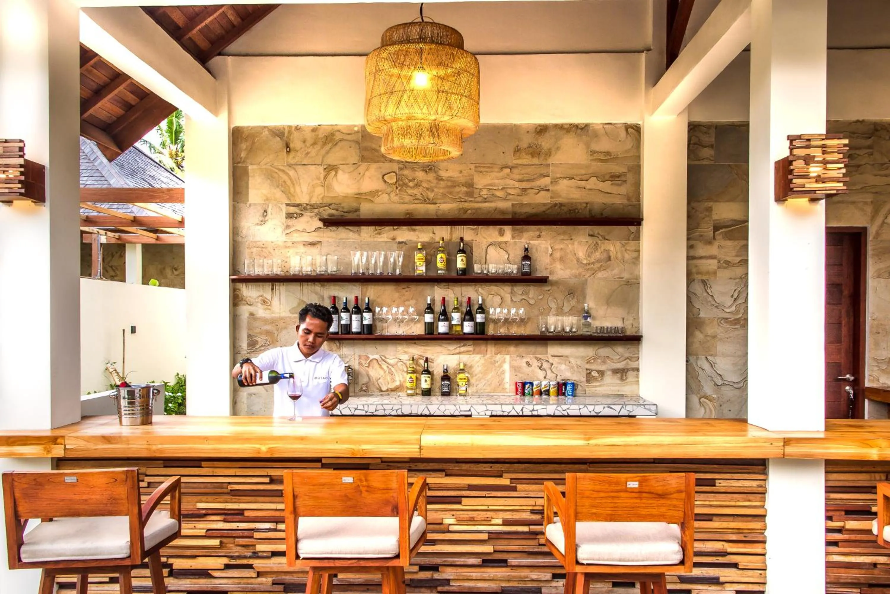 Communal lounge/ TV room in Utara Villas