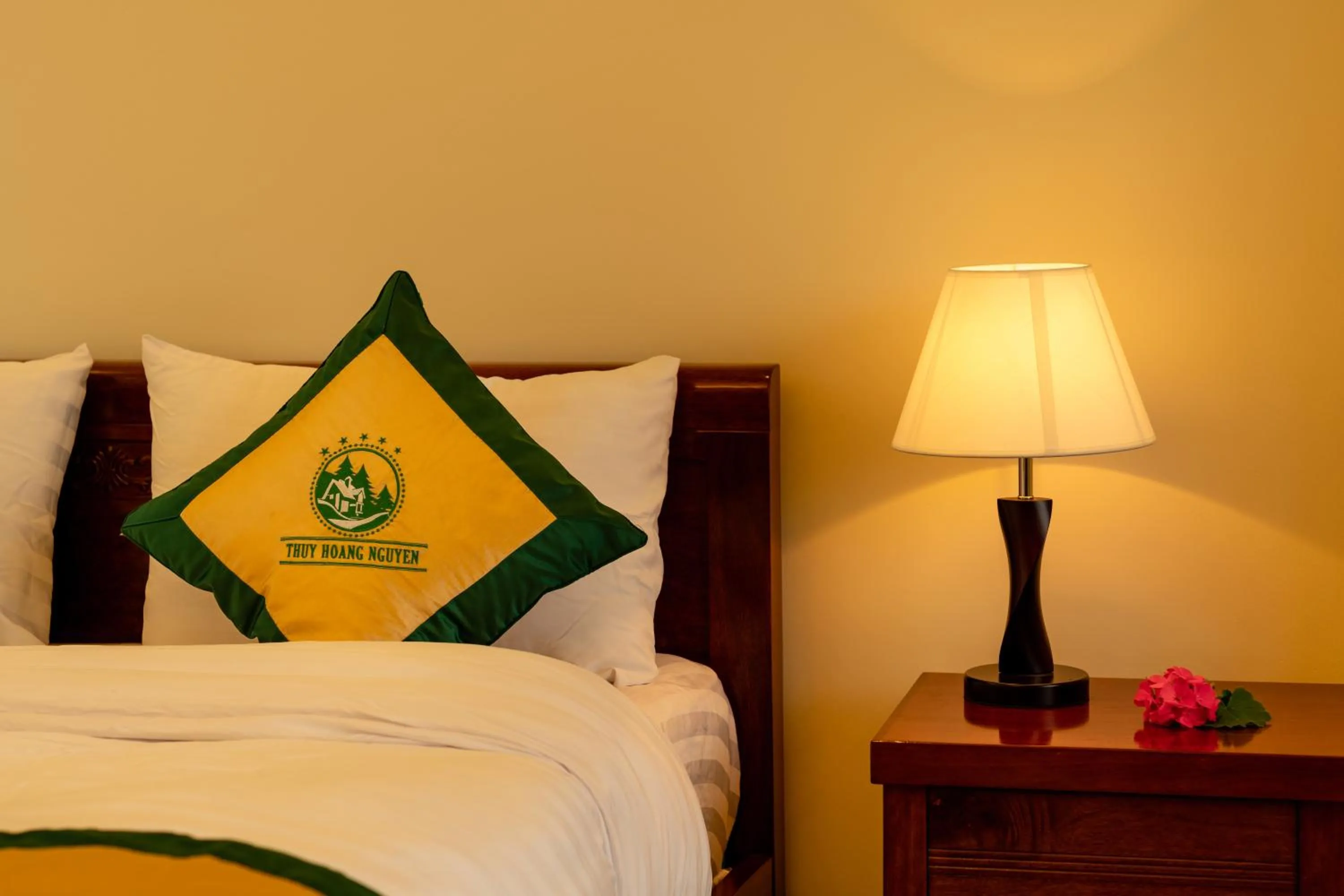 Bed in Thuy Hoang Nguyen Resort & Spa