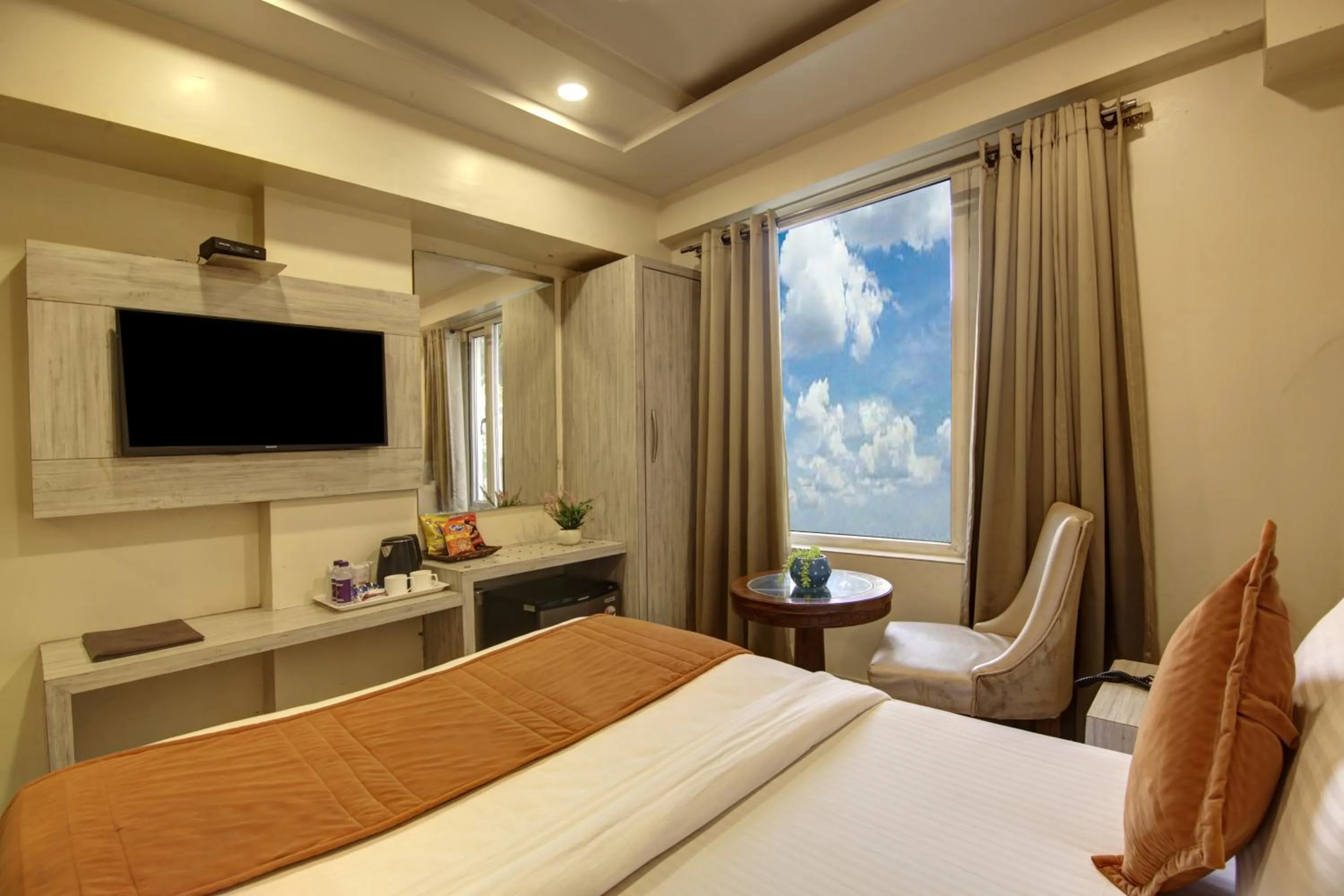 Seating area, Bed in The Shanti Plaza - Traveler's choice awarded 2025