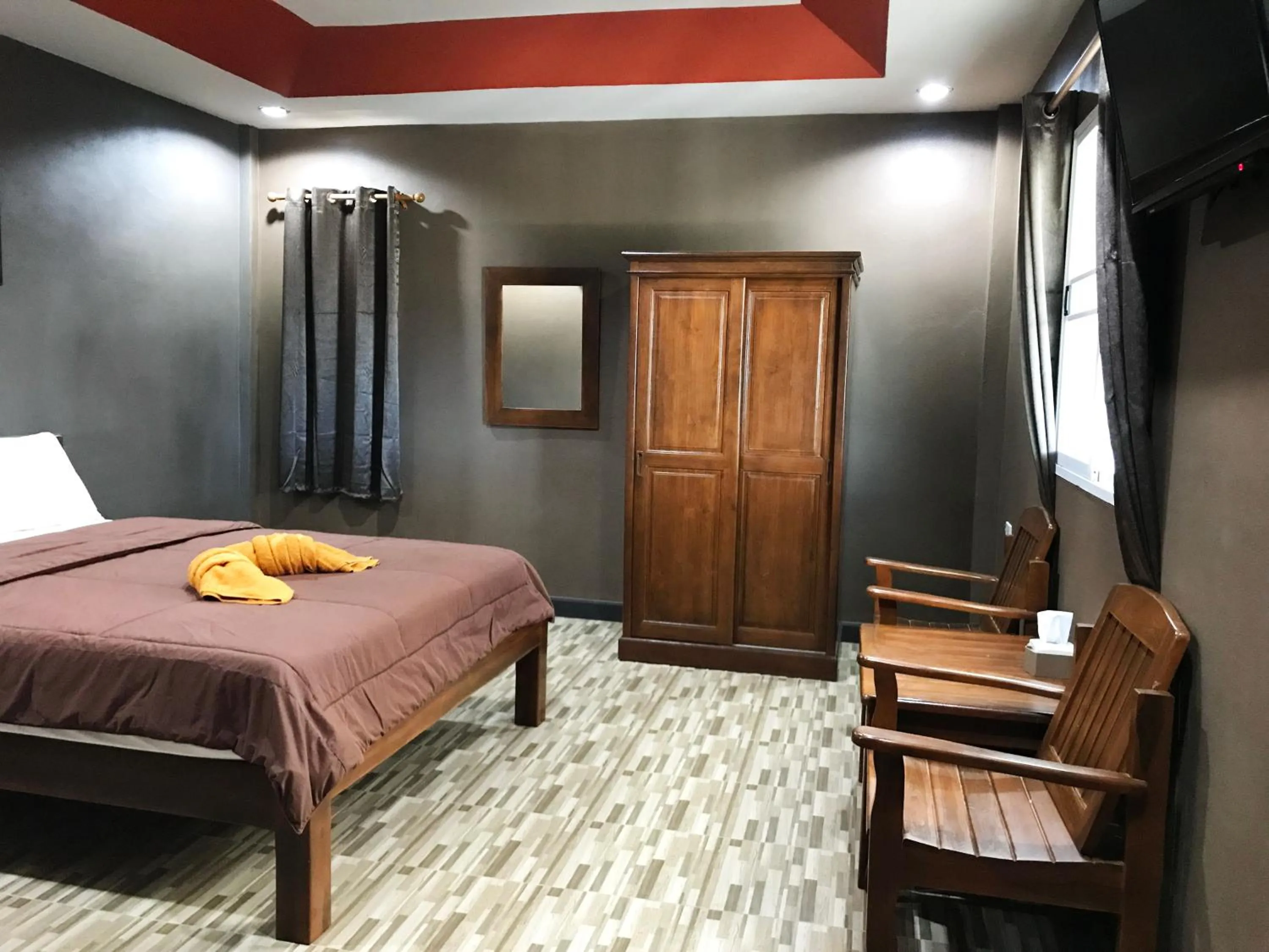 Photo of the whole room, Bed in Khwanruen Fishing Resort