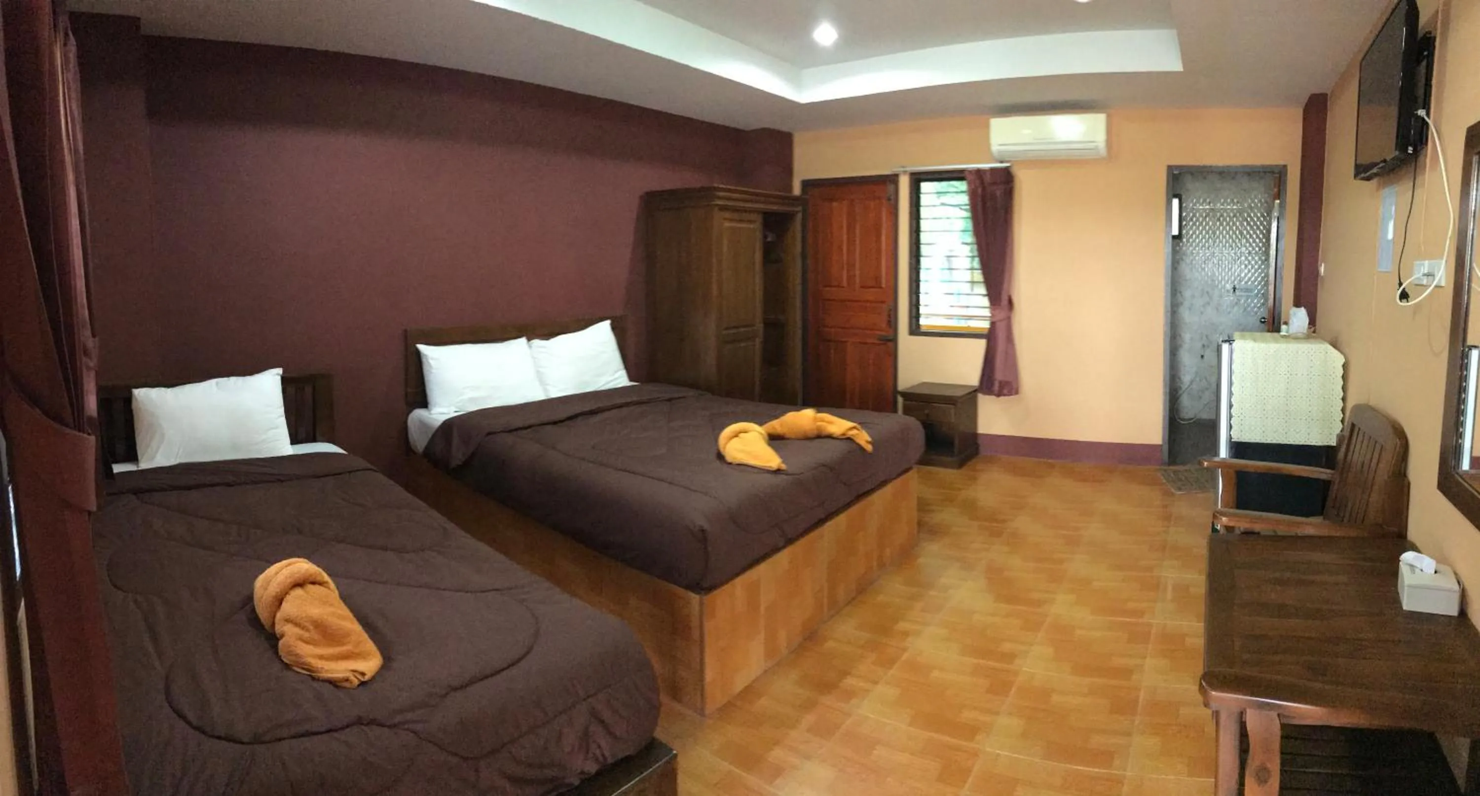 Bed in Khwanruen Fishing Resort