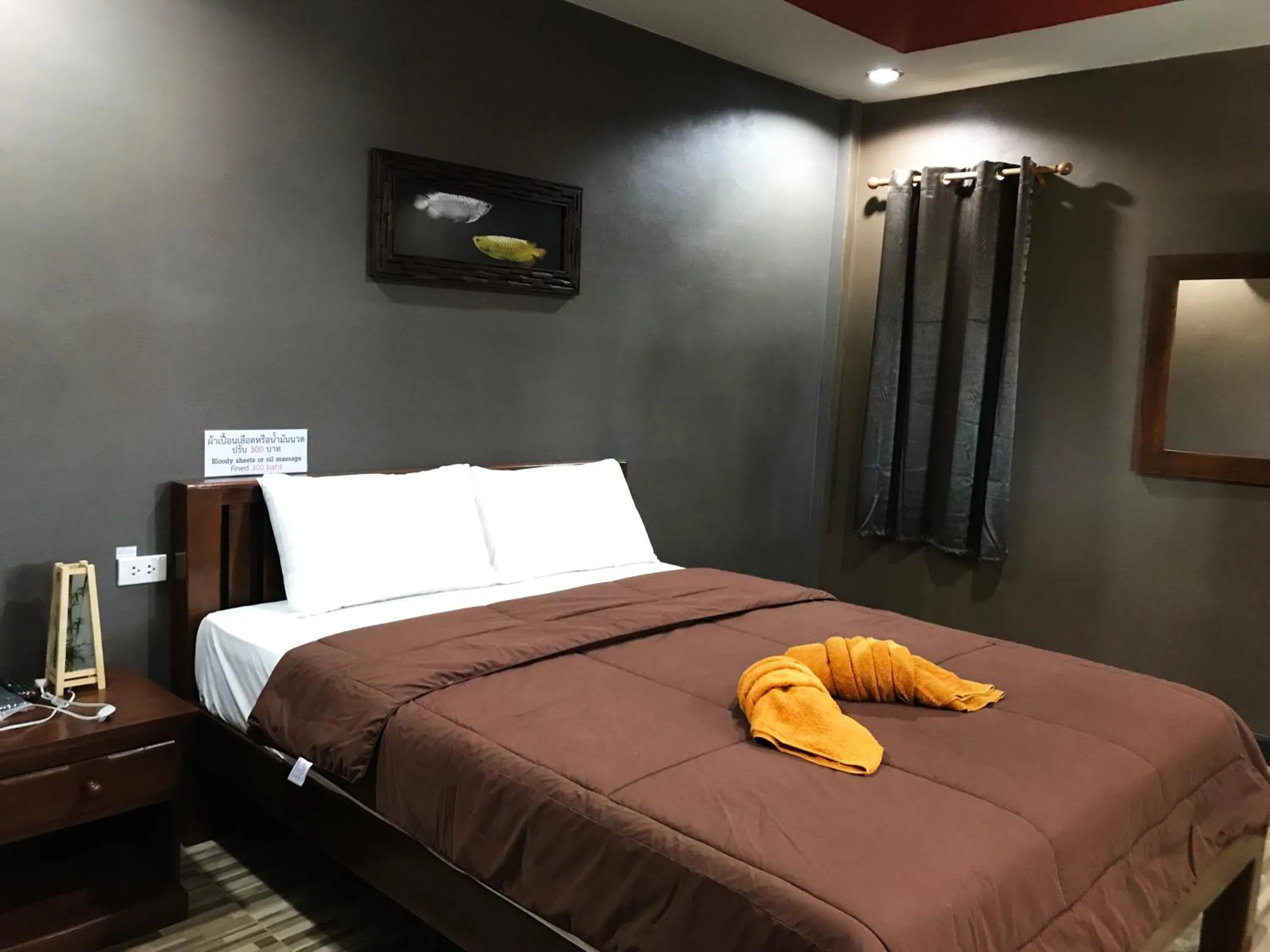 Photo of the whole room, Bed in Khwanruen Fishing Resort