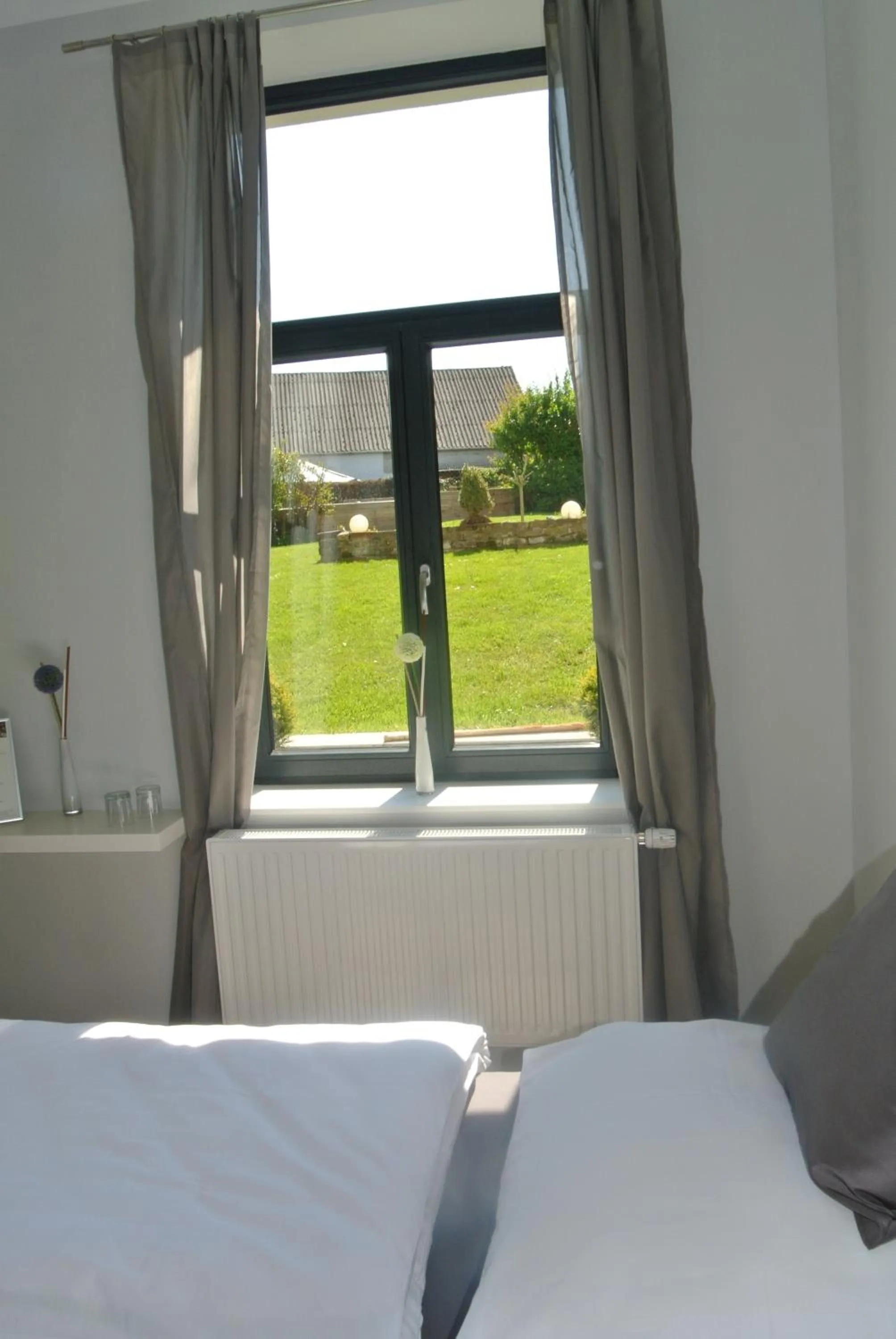 Bed in Gästehaus Tappes Hofgarten