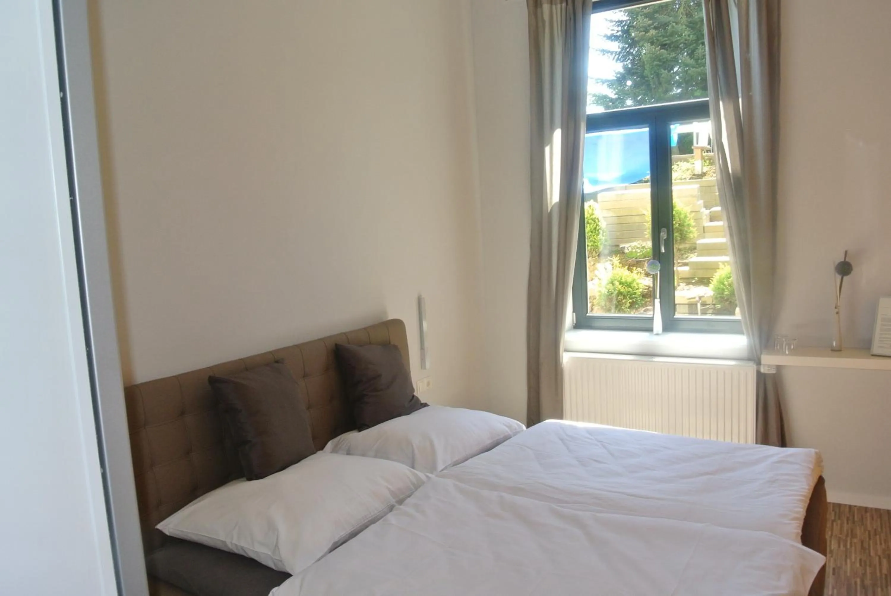 Bed in Gästehaus Tappes Hofgarten