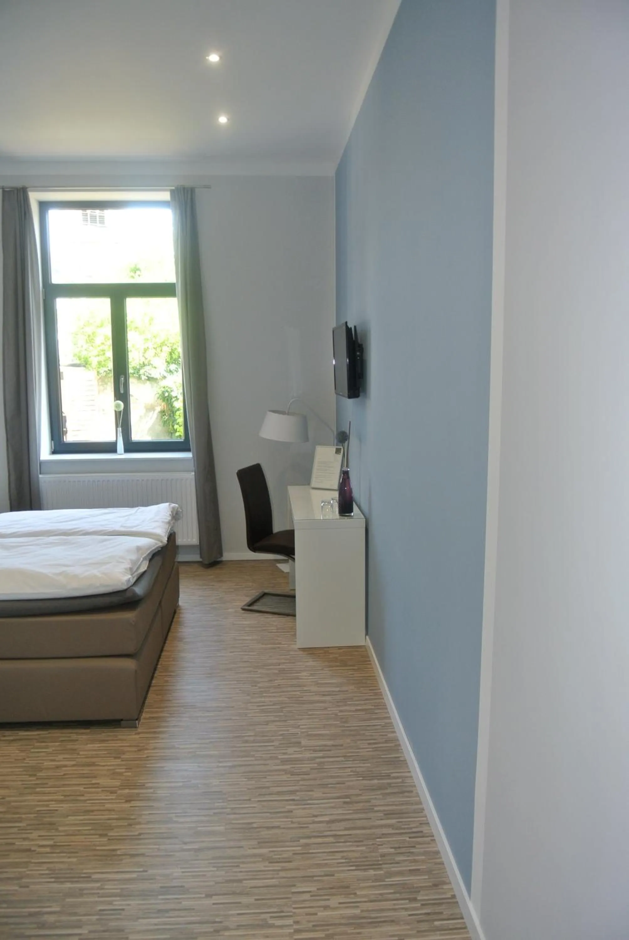 Bed in Gästehaus Tappes Hofgarten