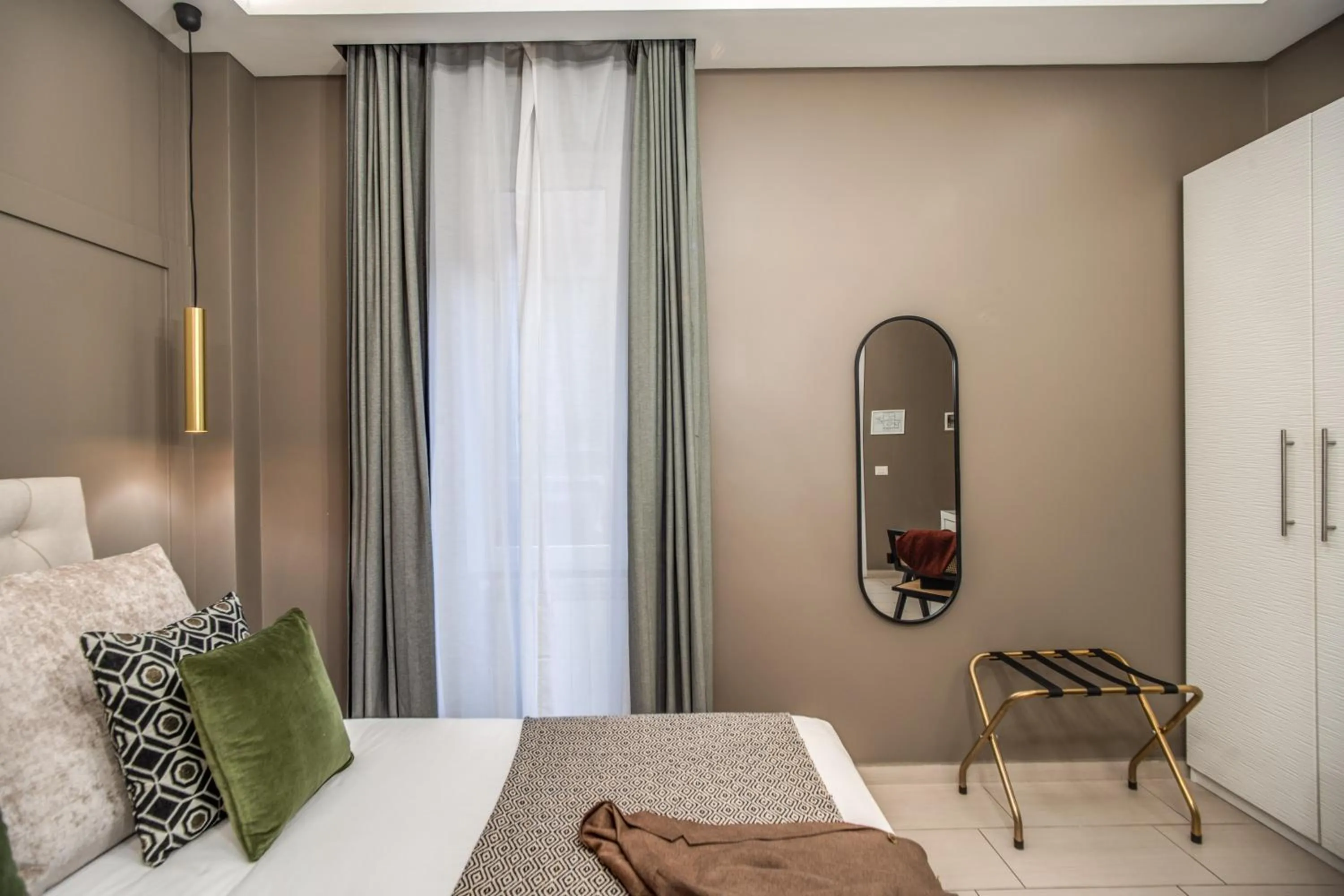 Bed in Borgognona Rooms