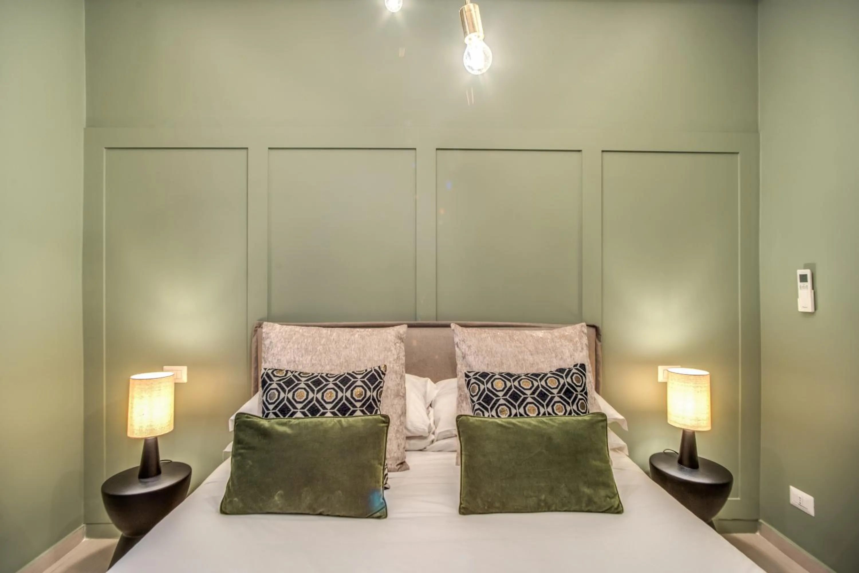 Bed in Borgognona Rooms