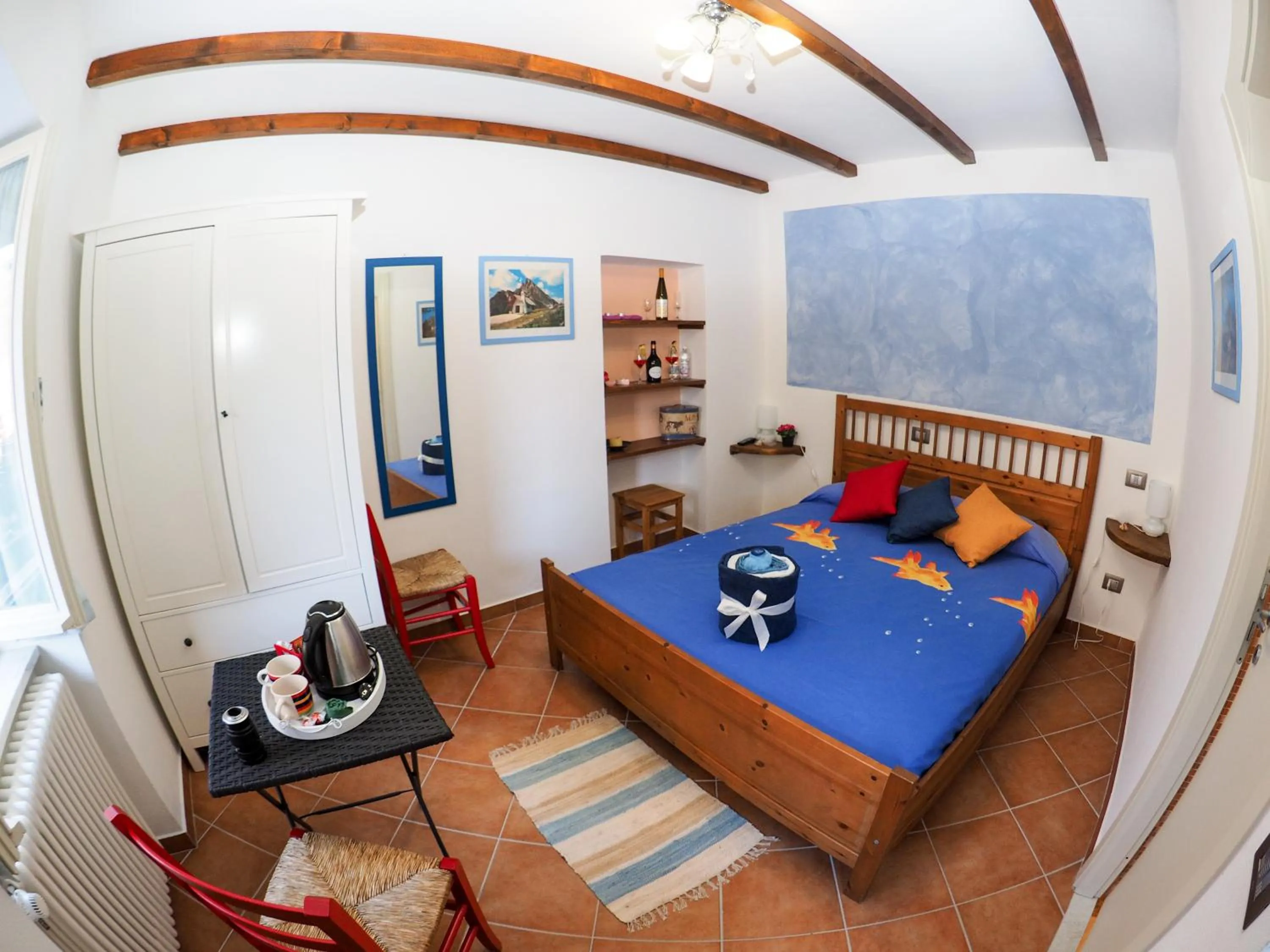 Photo of the whole room, Bed in Pietra Di Mare