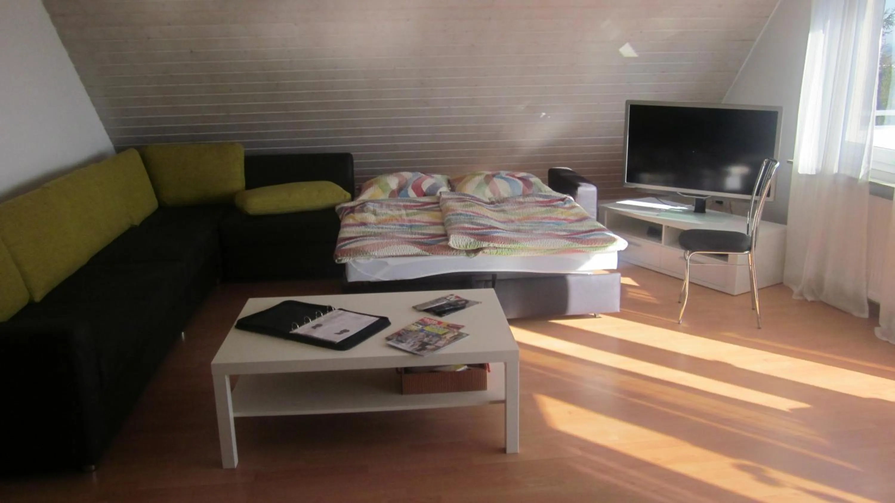 Photo of the whole room in Komfort Apartment 1 DG Jürgen Kunzi