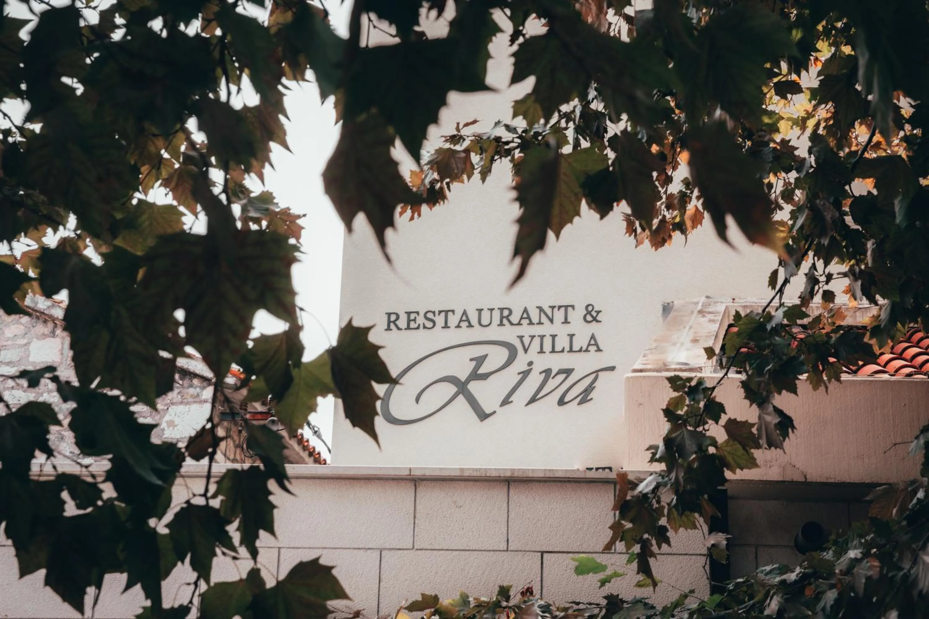 Property logo or sign in Villa Riva