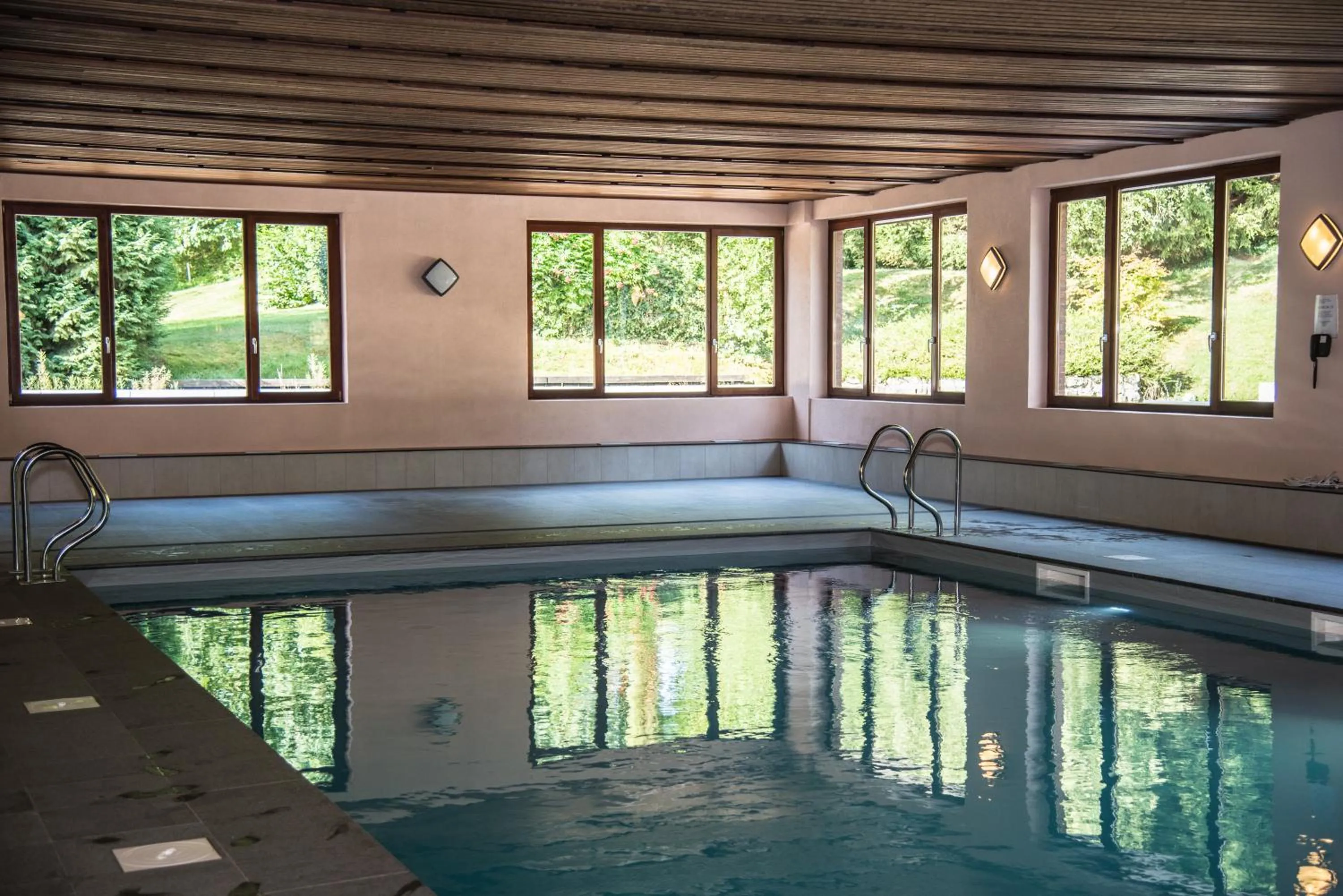 Pool view in Le Relais Du Marquis