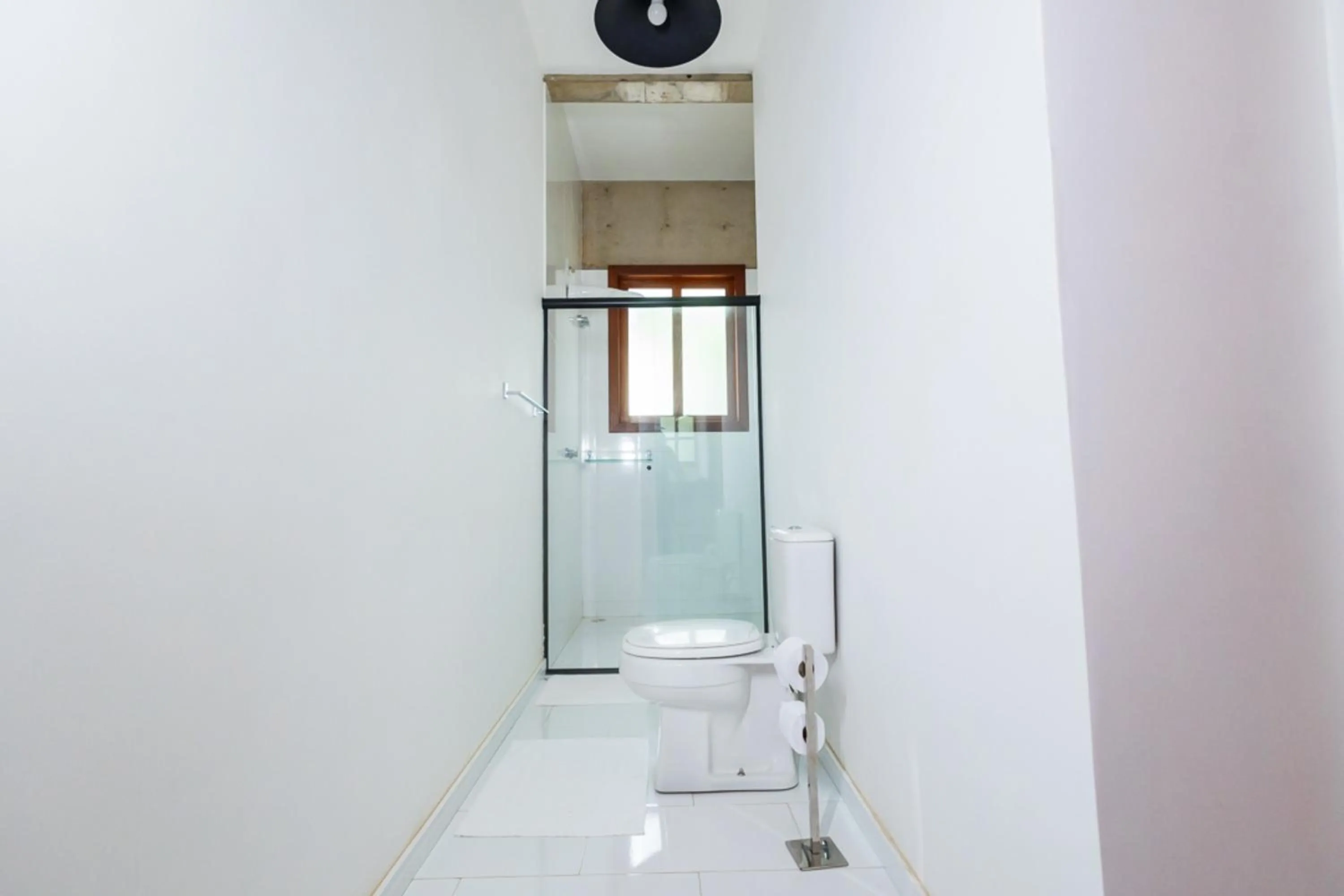 Bathroom in Putini Pousada e Hotel by OYO