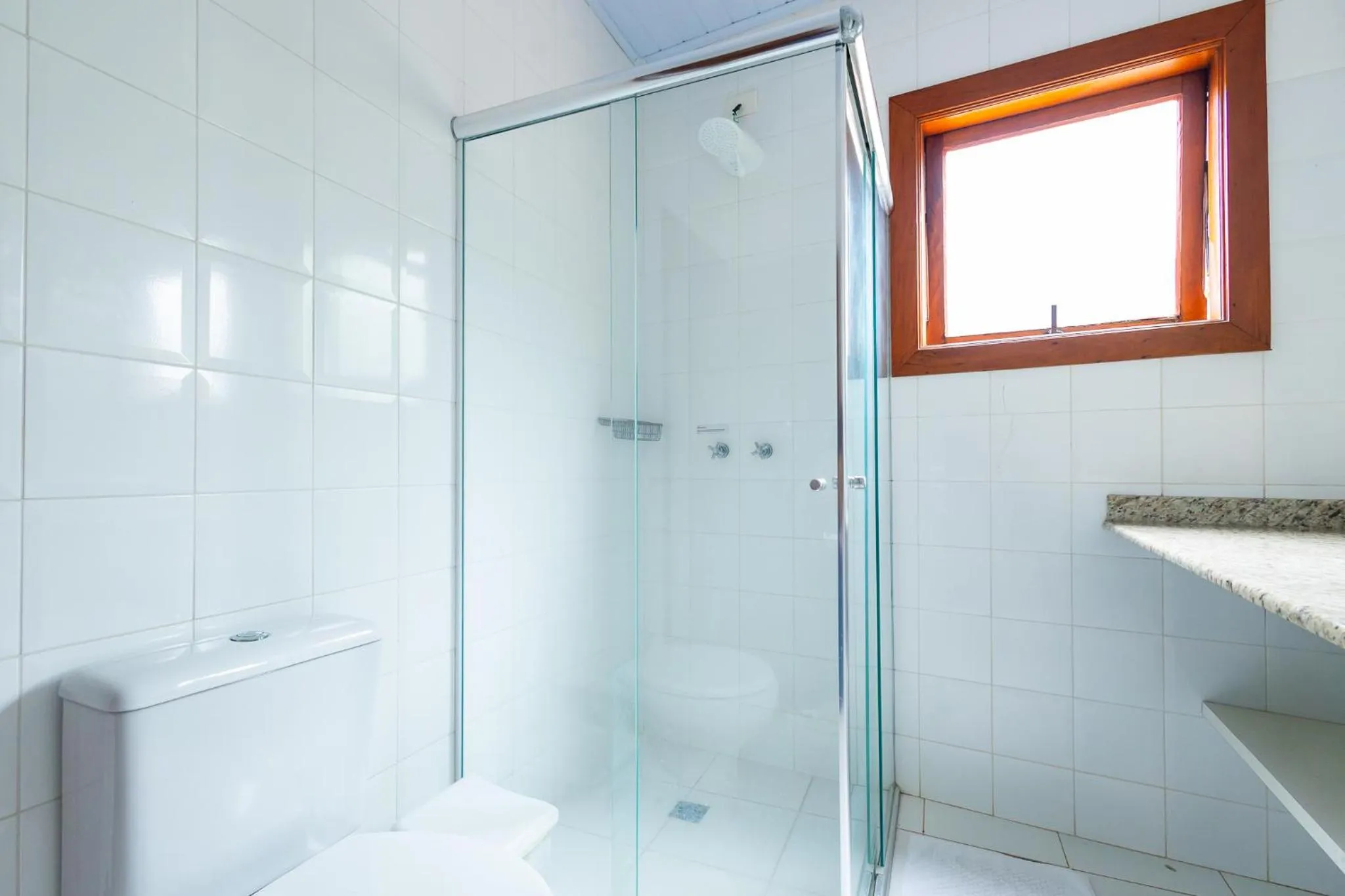 Bathroom in Putini Pousada e Hotel by OYO