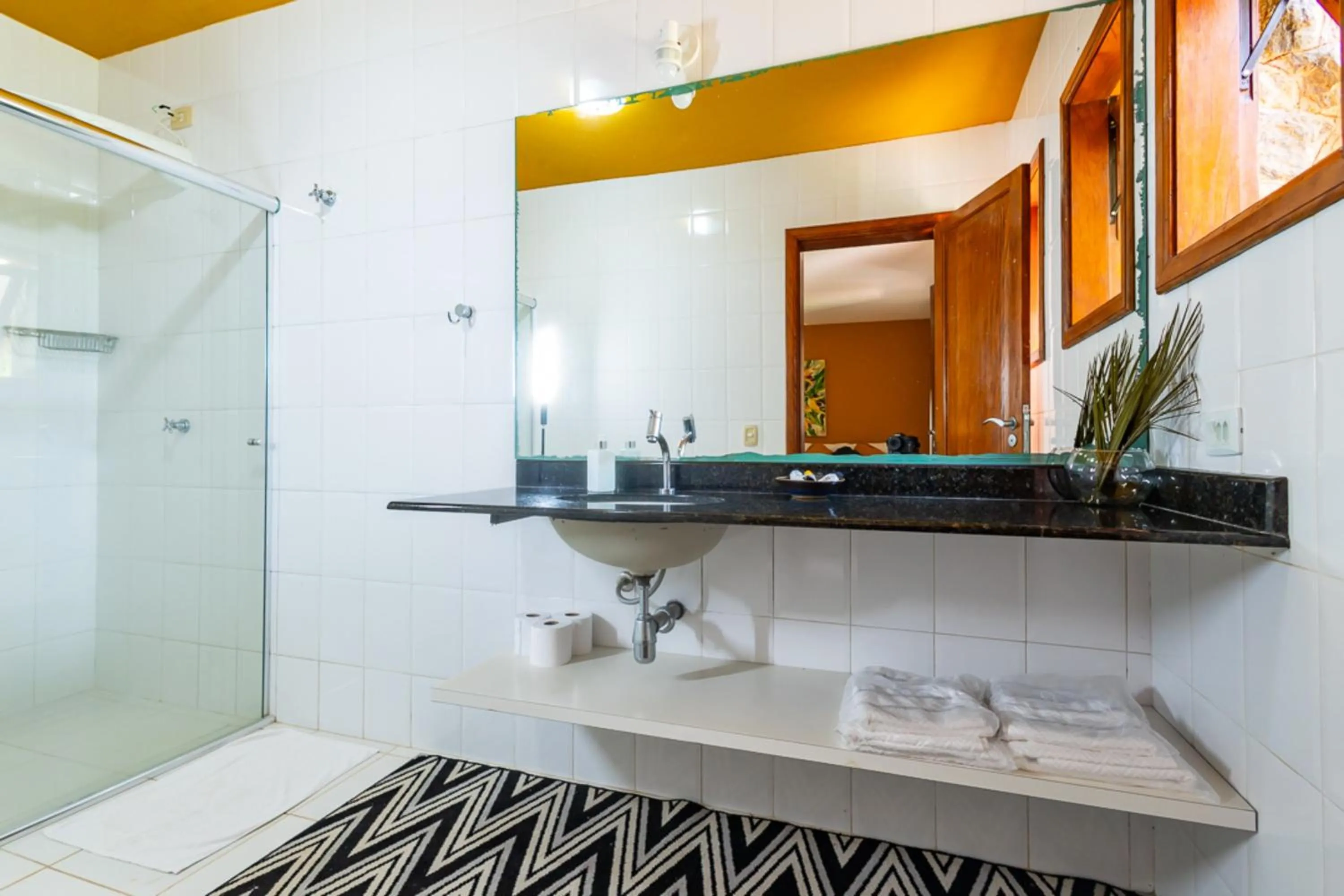 Bathroom in Putini Pousada e Hotel by OYO