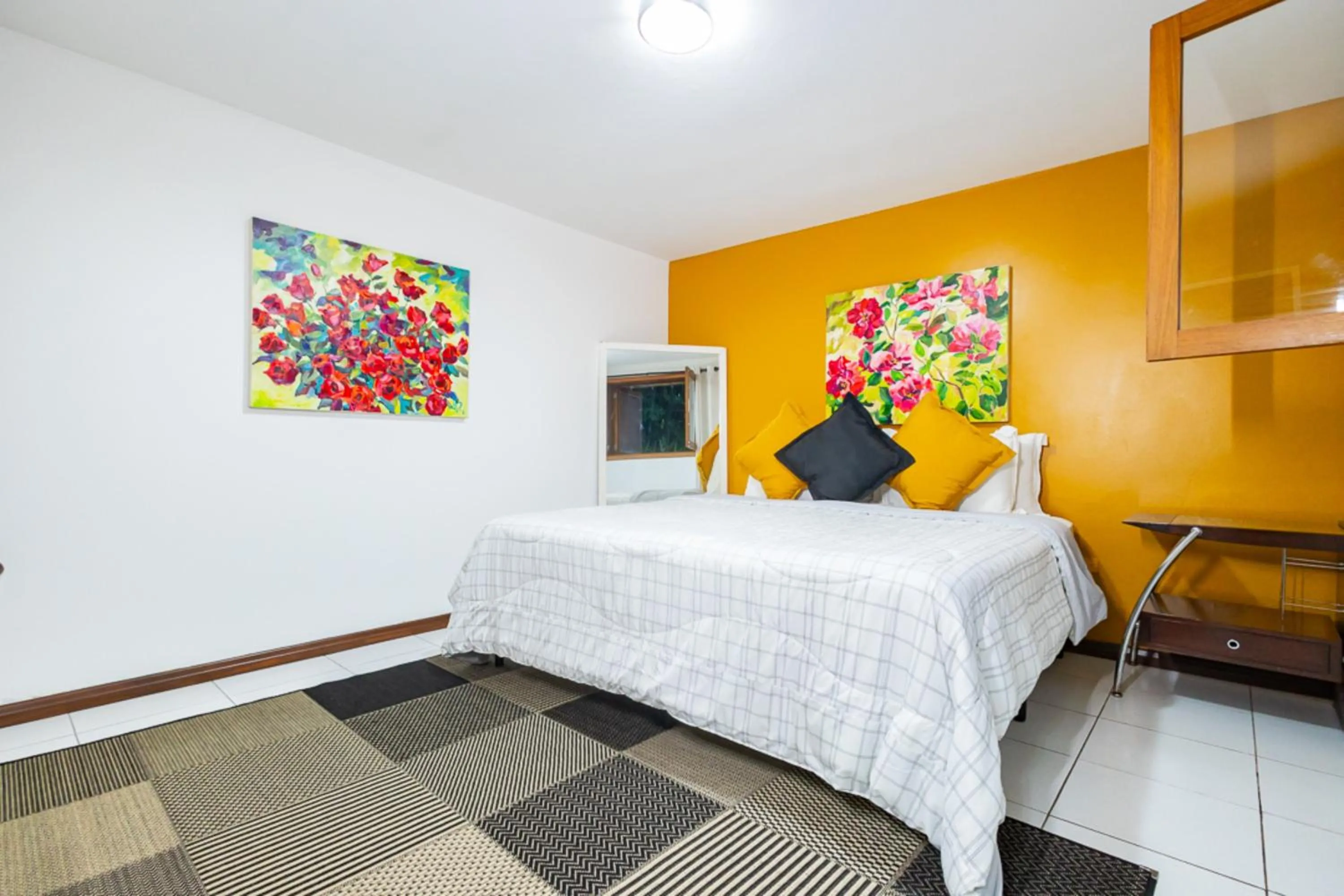 Bedroom, Bed in Putini Pousada e Hotel by OYO