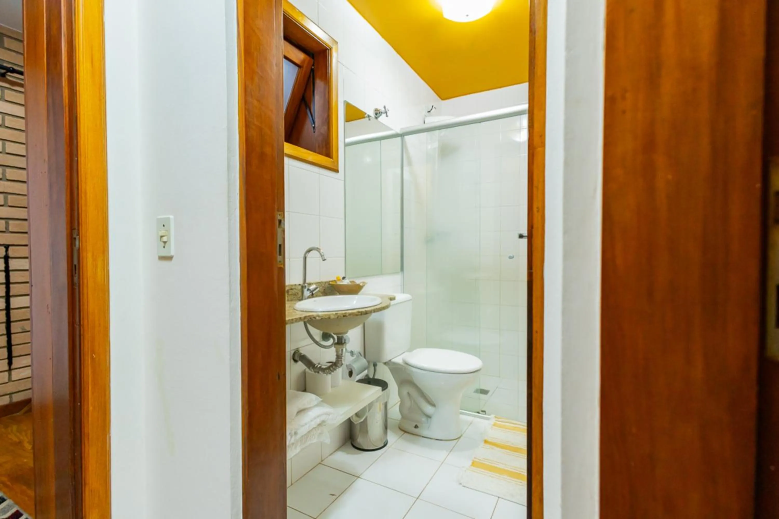 Bathroom in Putini Pousada e Hotel by OYO