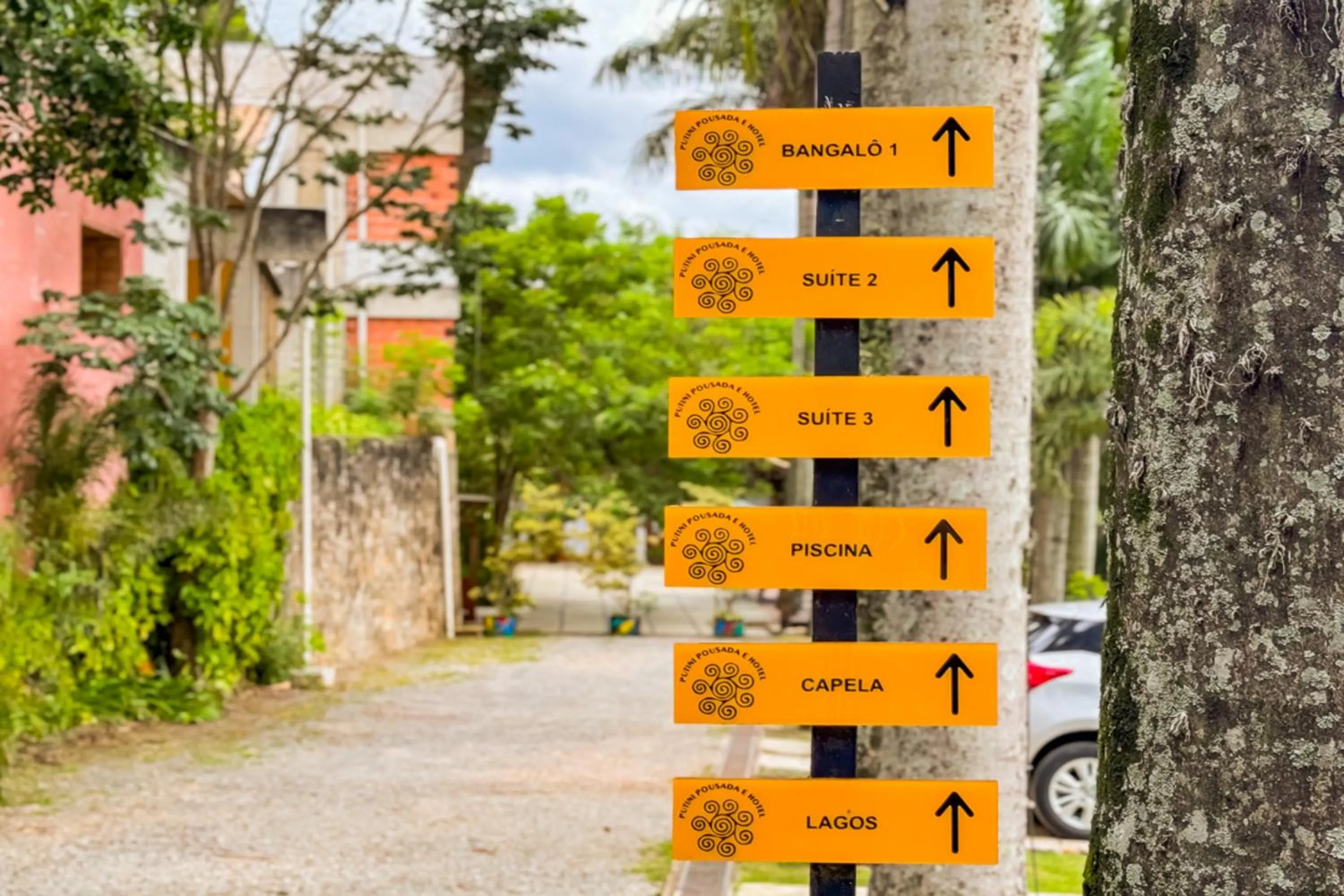 Property logo or sign in Putini Pousada e Hotel by OYO