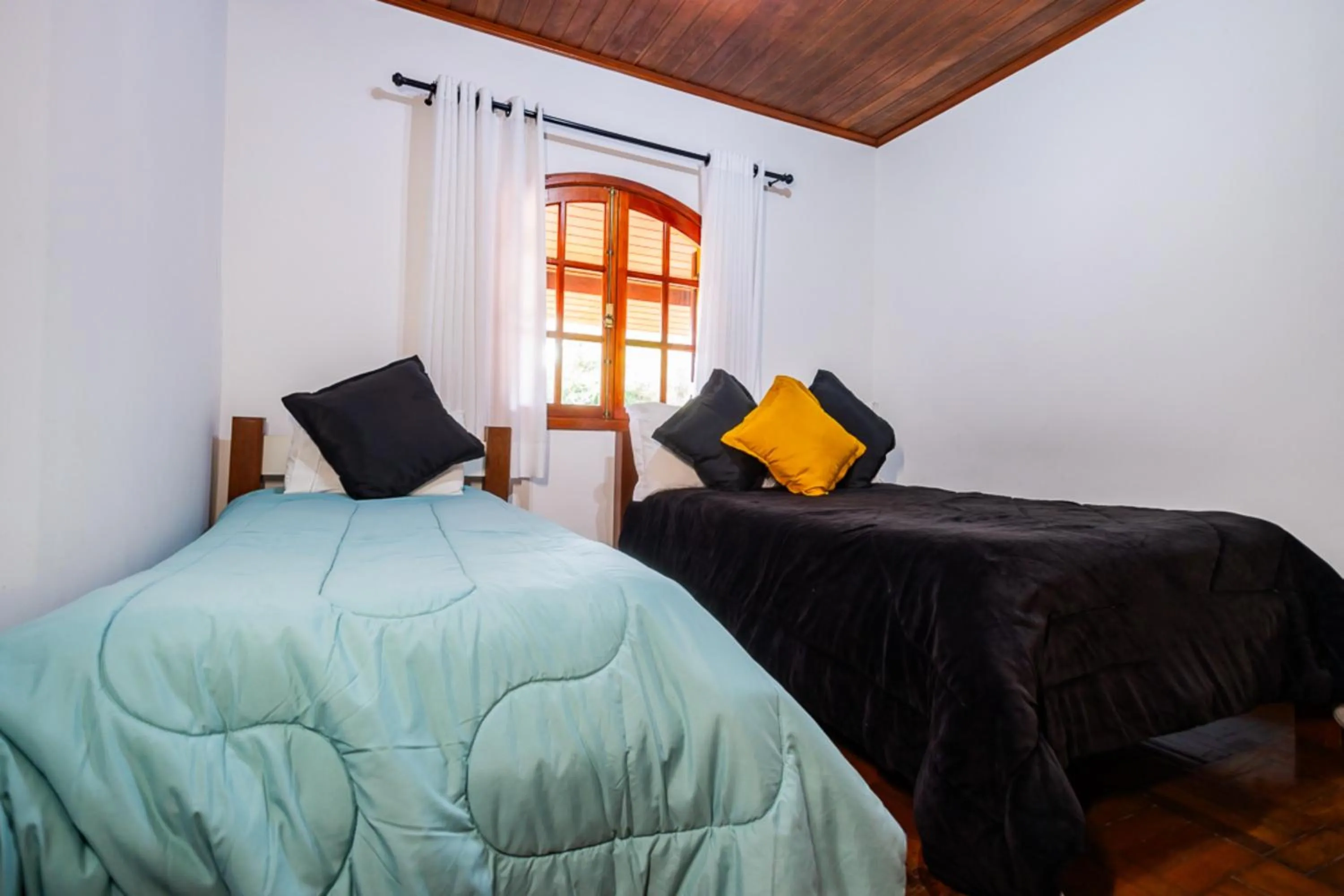 Bedroom, Bed in Putini Pousada e Hotel by OYO