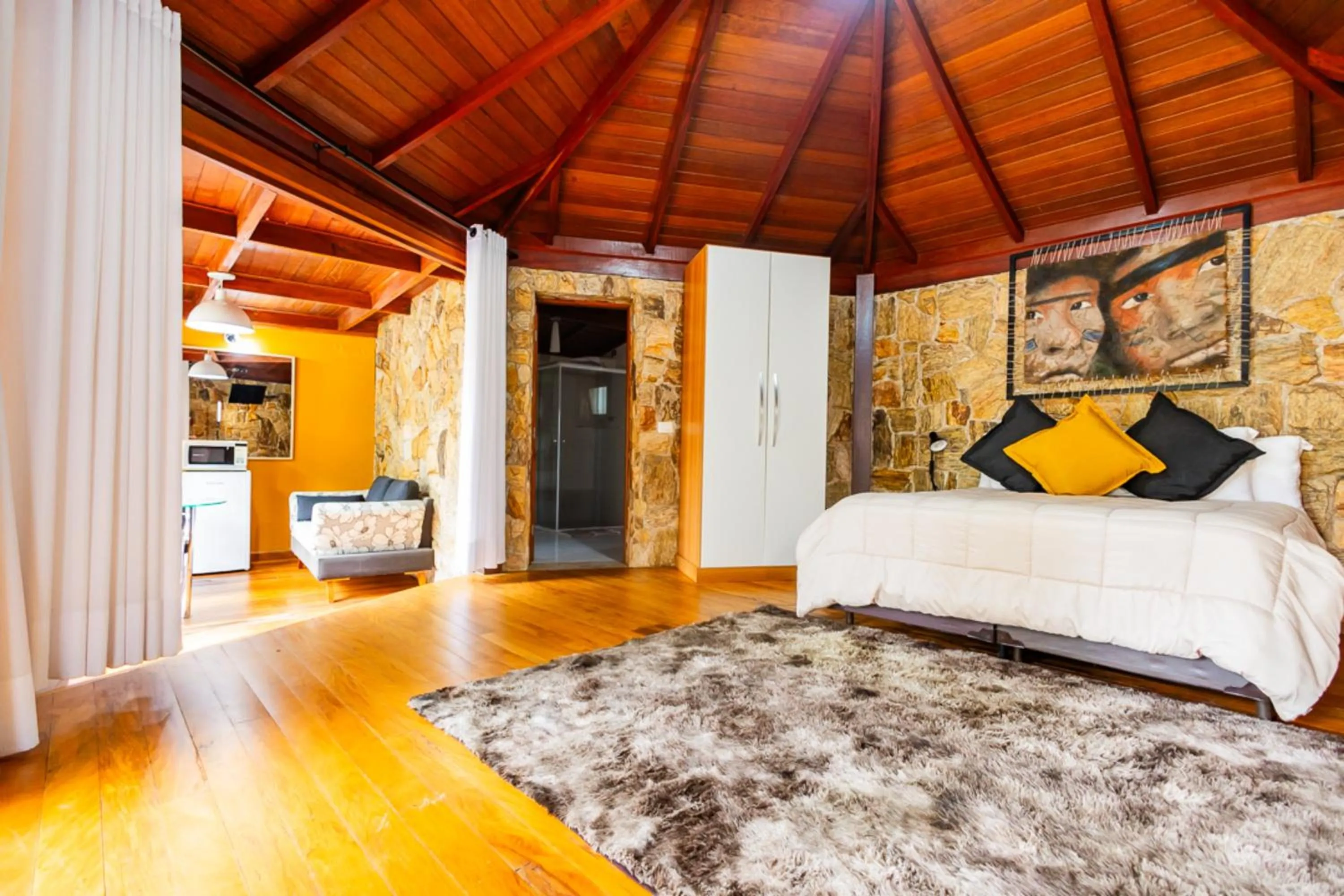 Bedroom, Bed in Putini Pousada e Hotel by OYO