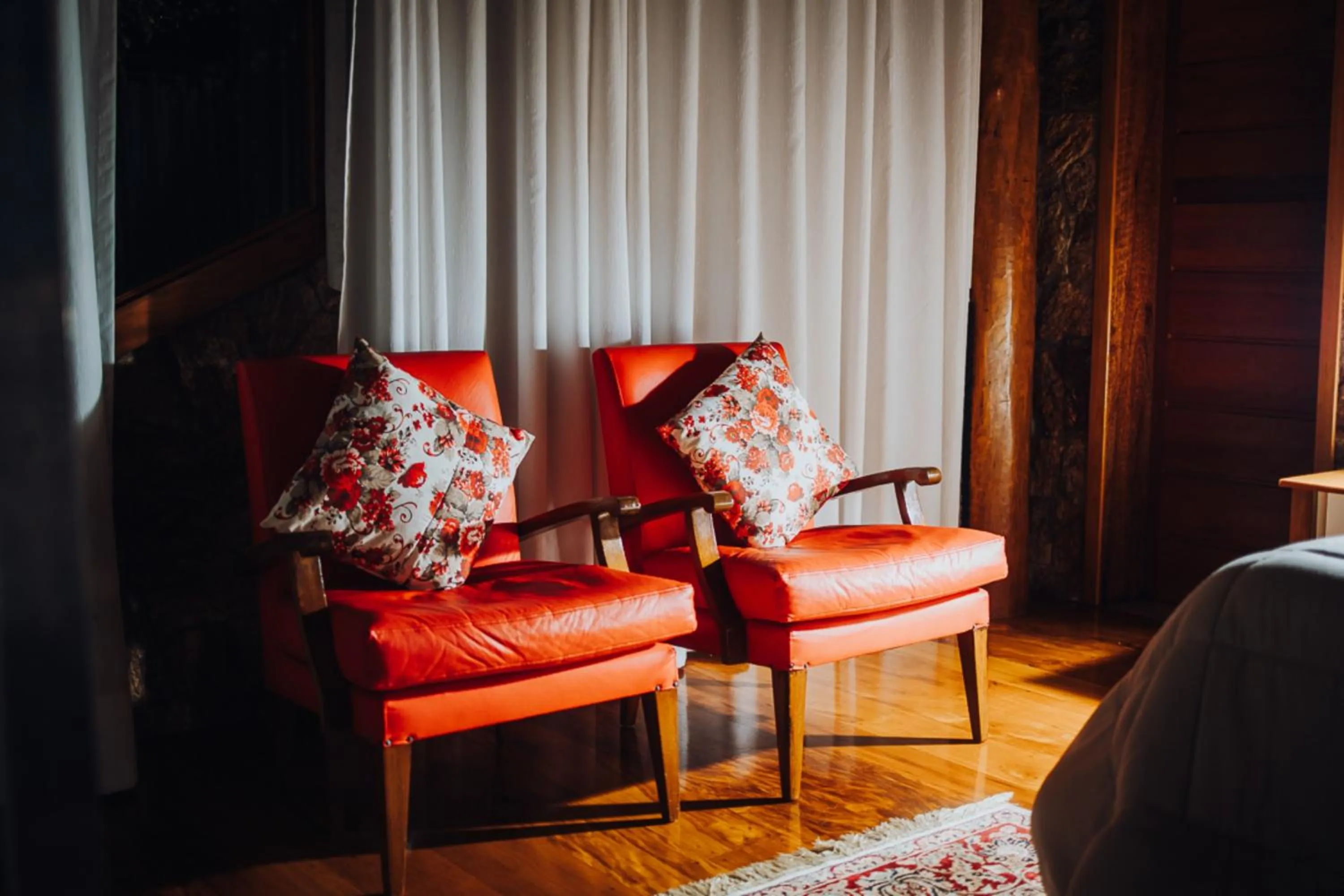 Seating area in Putini Pousada e Hotel by OYO