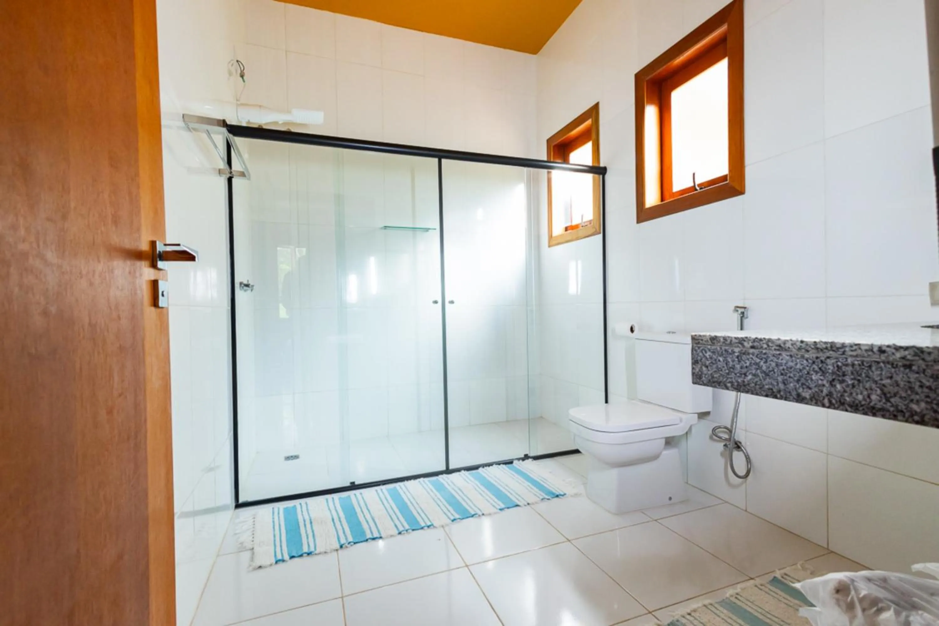 Bathroom in Putini Pousada e Hotel by OYO