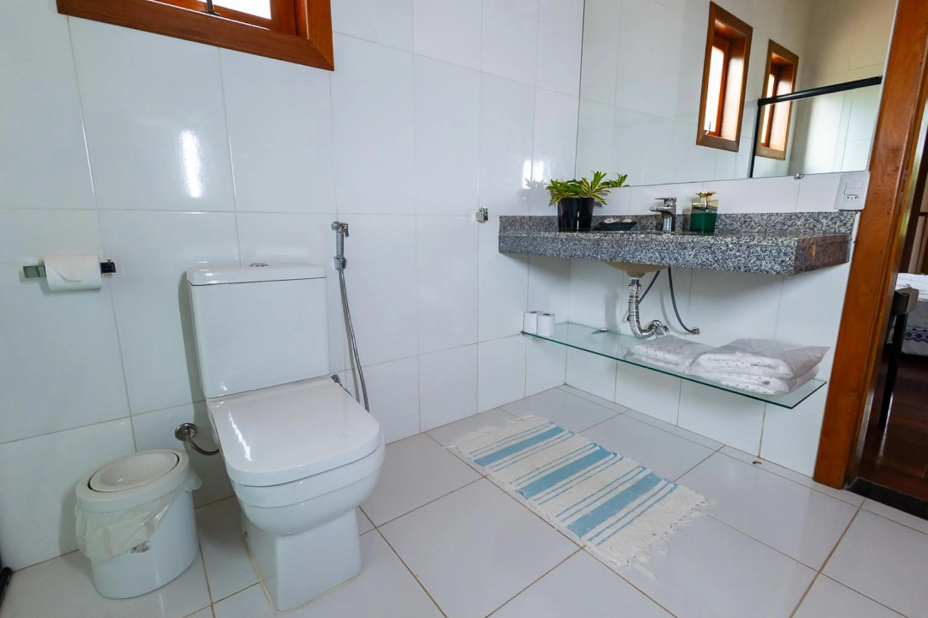 Bathroom in Putini Pousada e Hotel by OYO