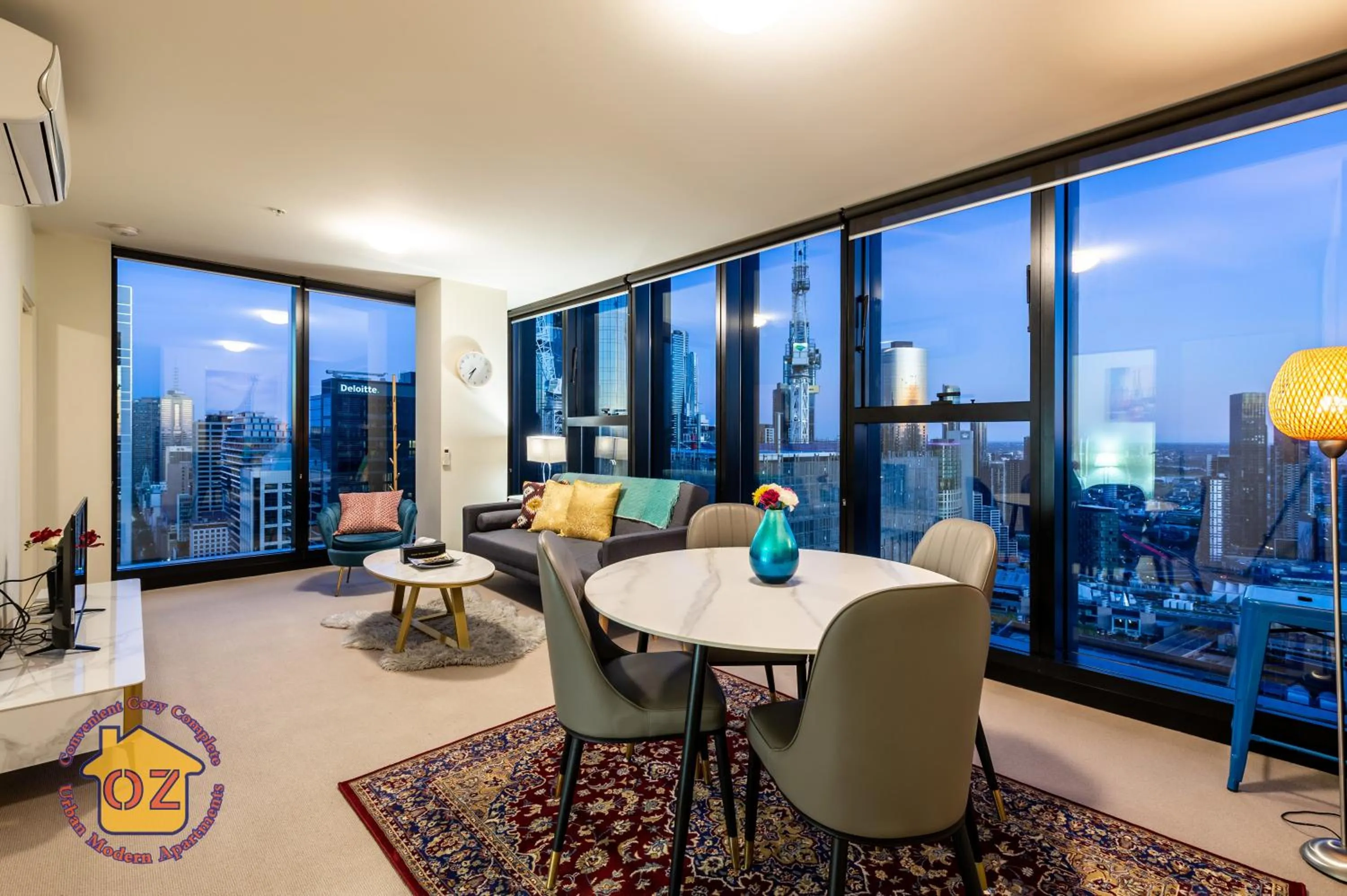 Living room in Aussie Escape Apartments-Skyline Collins Tower