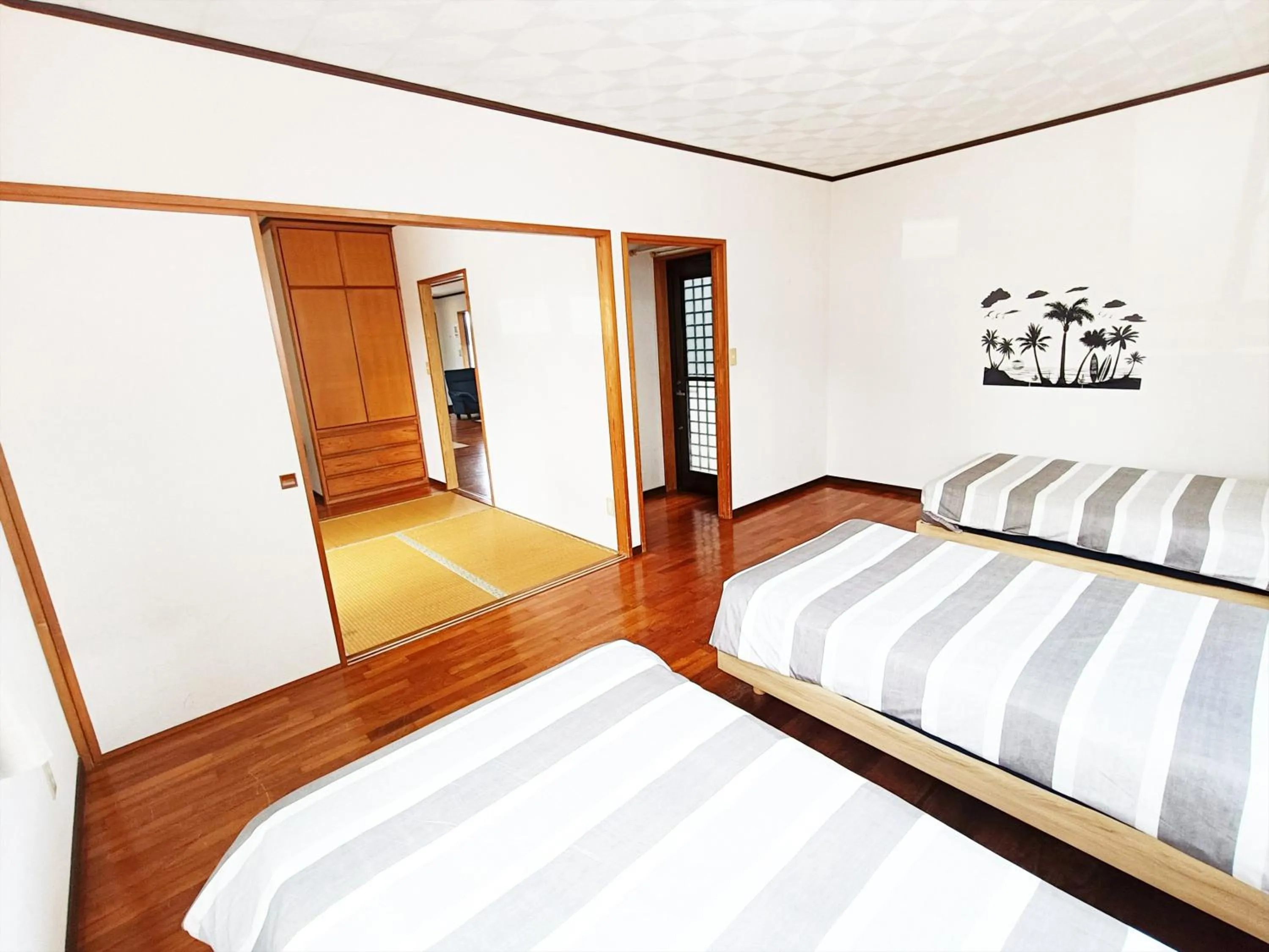 Bedroom, Bed in Kariyushi Condominium Resort Sea Side House
