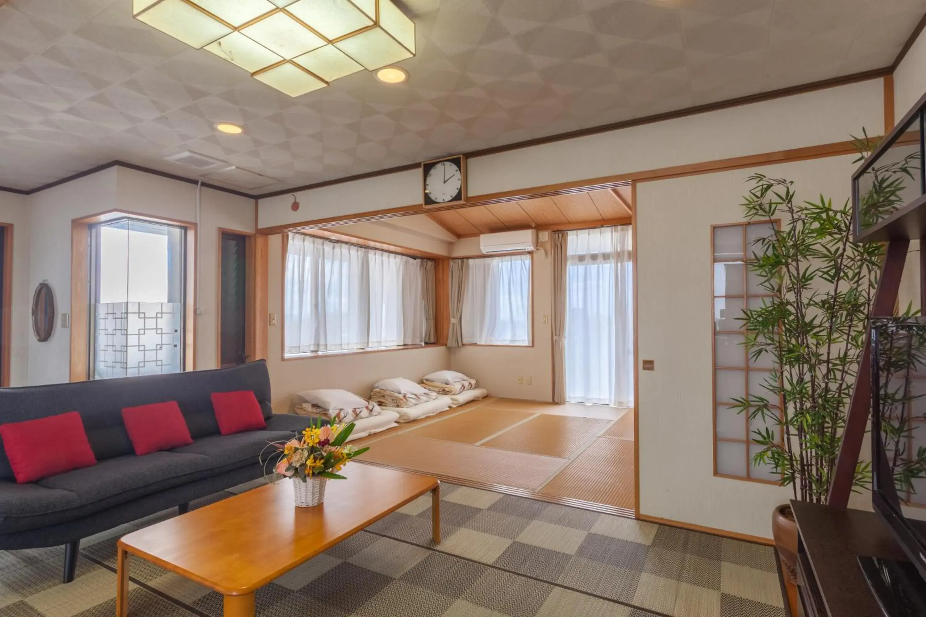 Living room in Kariyushi Condominium Resort Sea Side House Living room in Kariyushi Condominium Resort Sea Side House