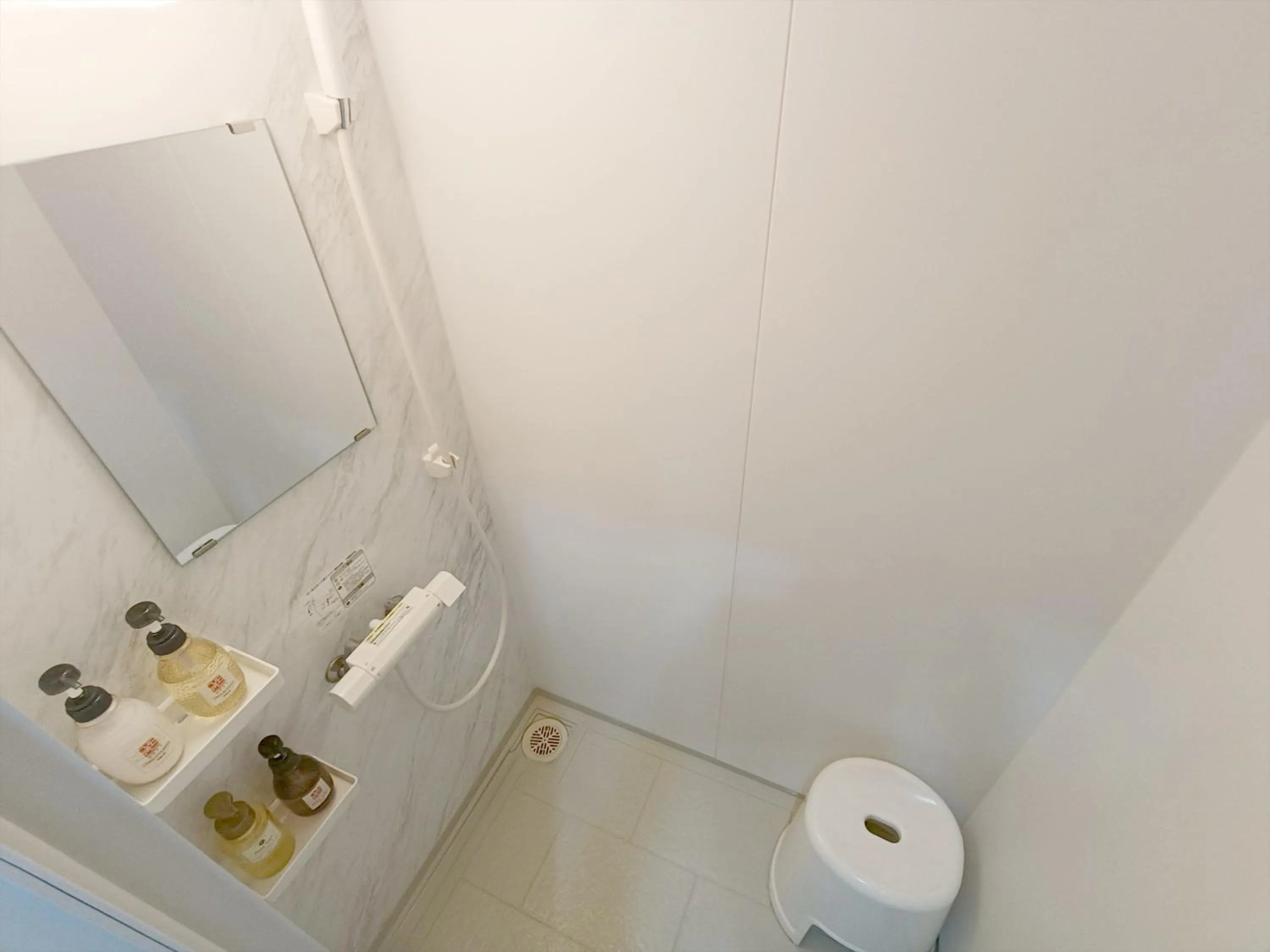 Shower in Kariyushi Condominium Resort Sea Side House