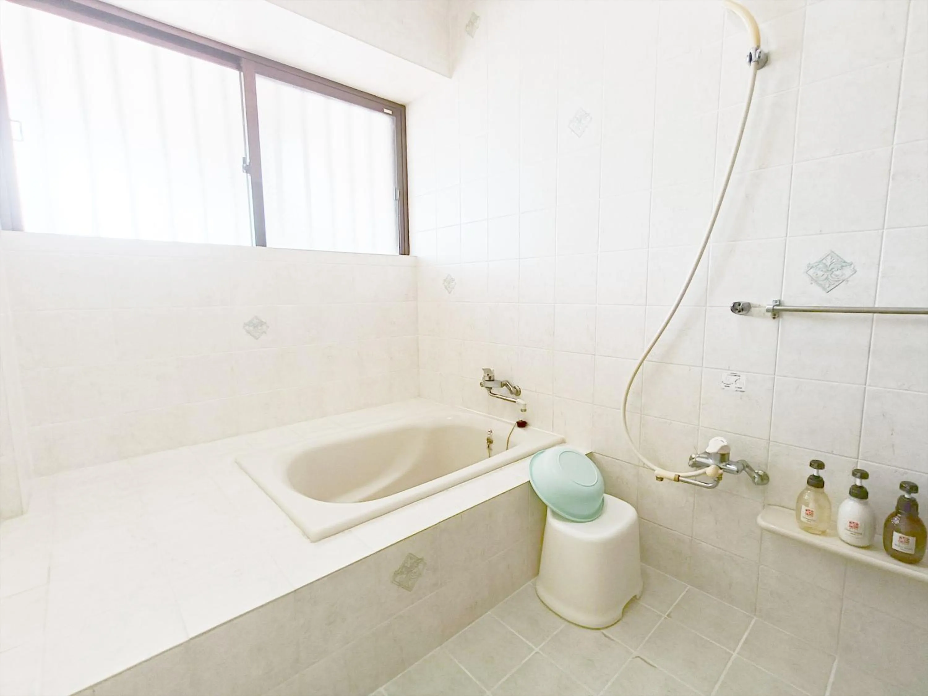 Bathroom in Kariyushi Condominium Resort Sea Side House