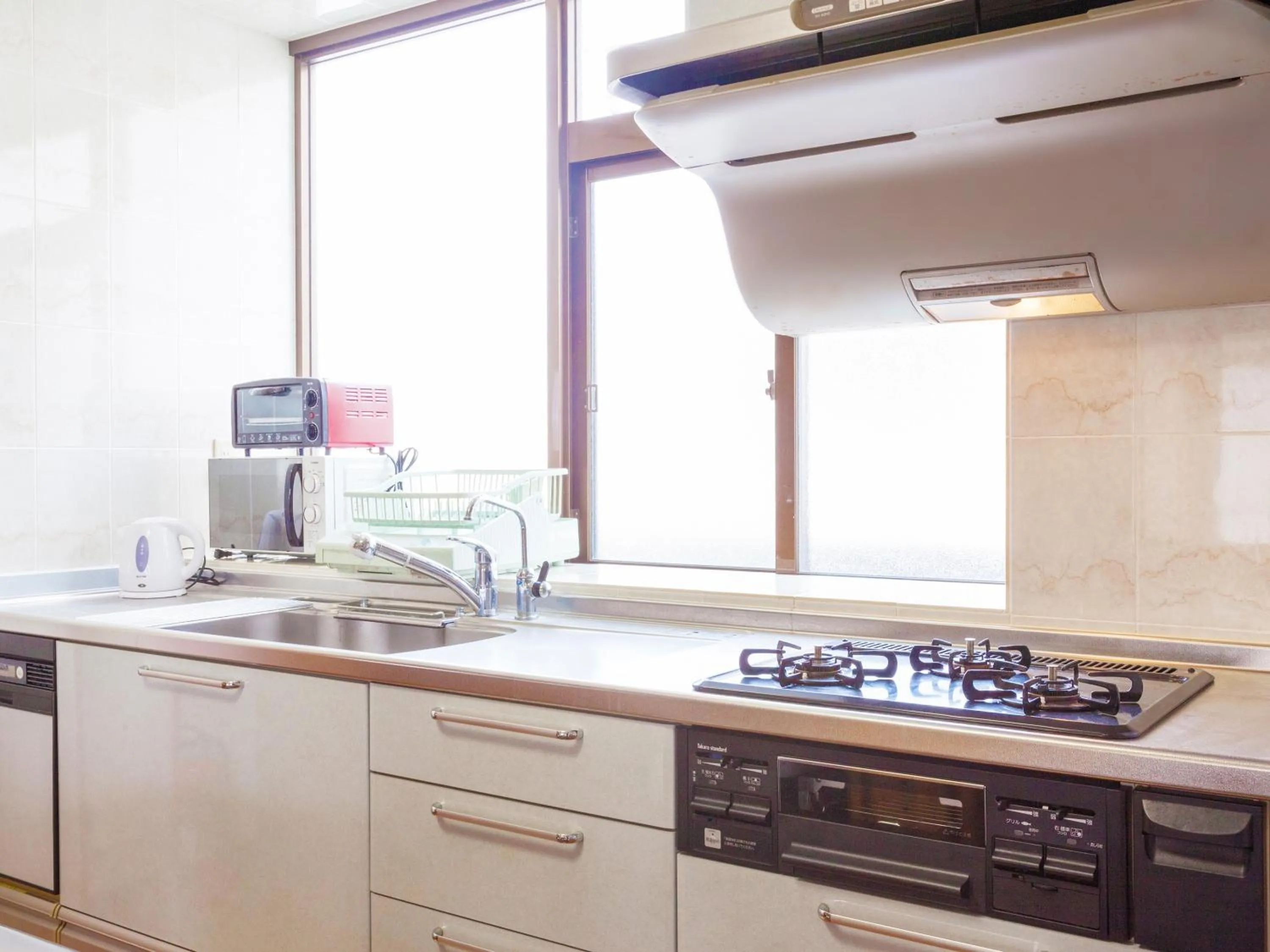 Kitchen or kitchenette in Kariyushi Condominium Resort Sea Side House
