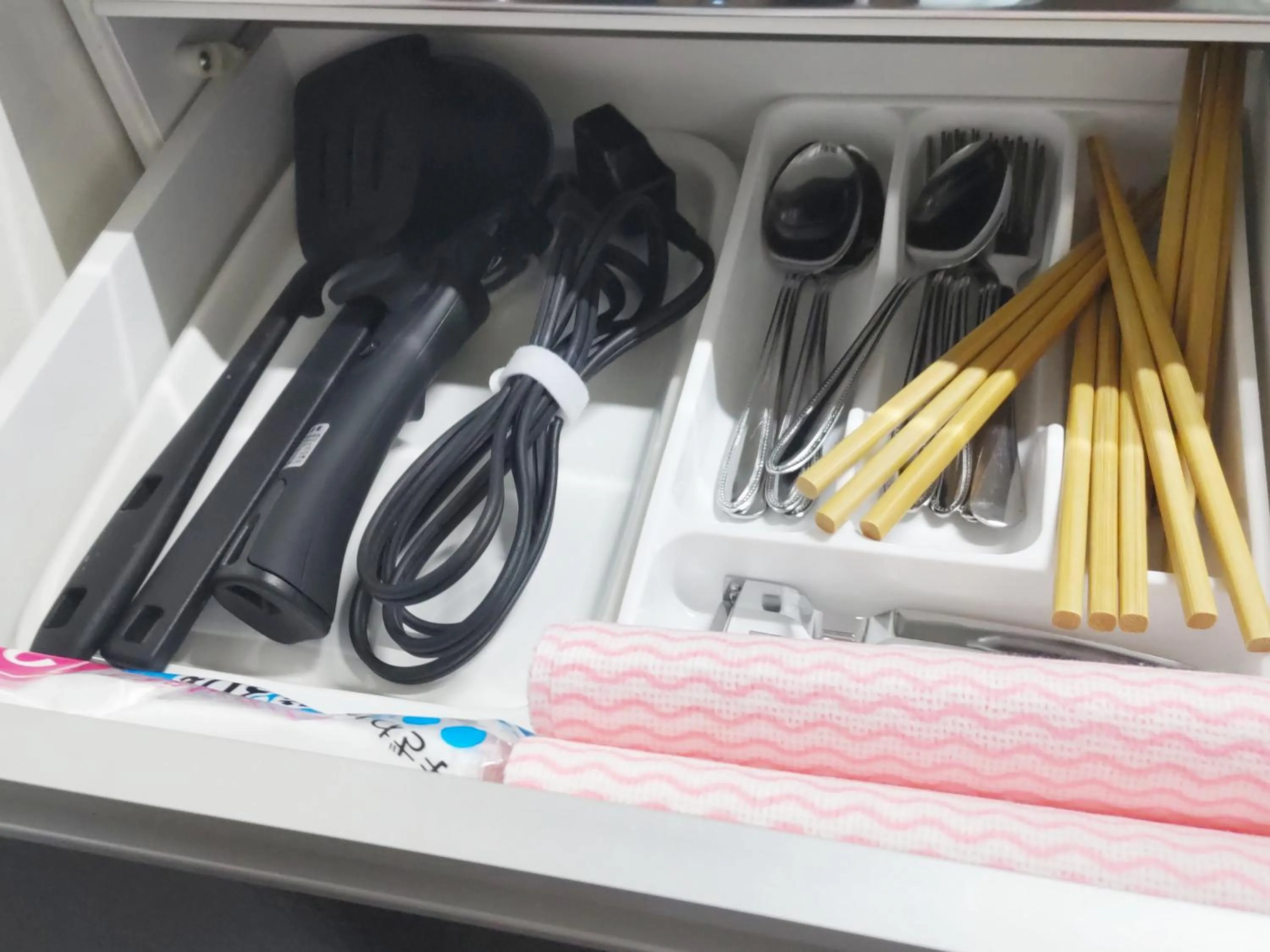 Kitchen or kitchenette in Kariyushi Condominium Resort Sea Side House