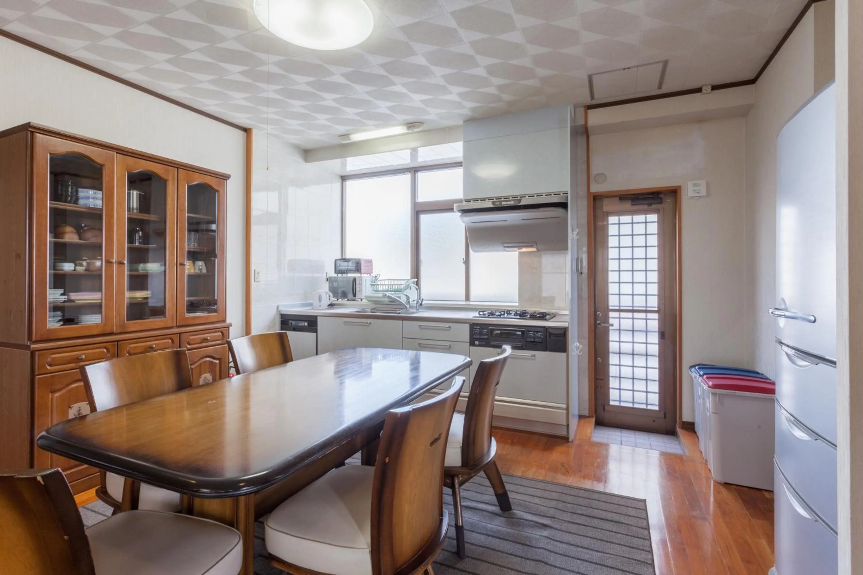Kitchen or kitchenette in Kariyushi Condominium Resort Sea Side House