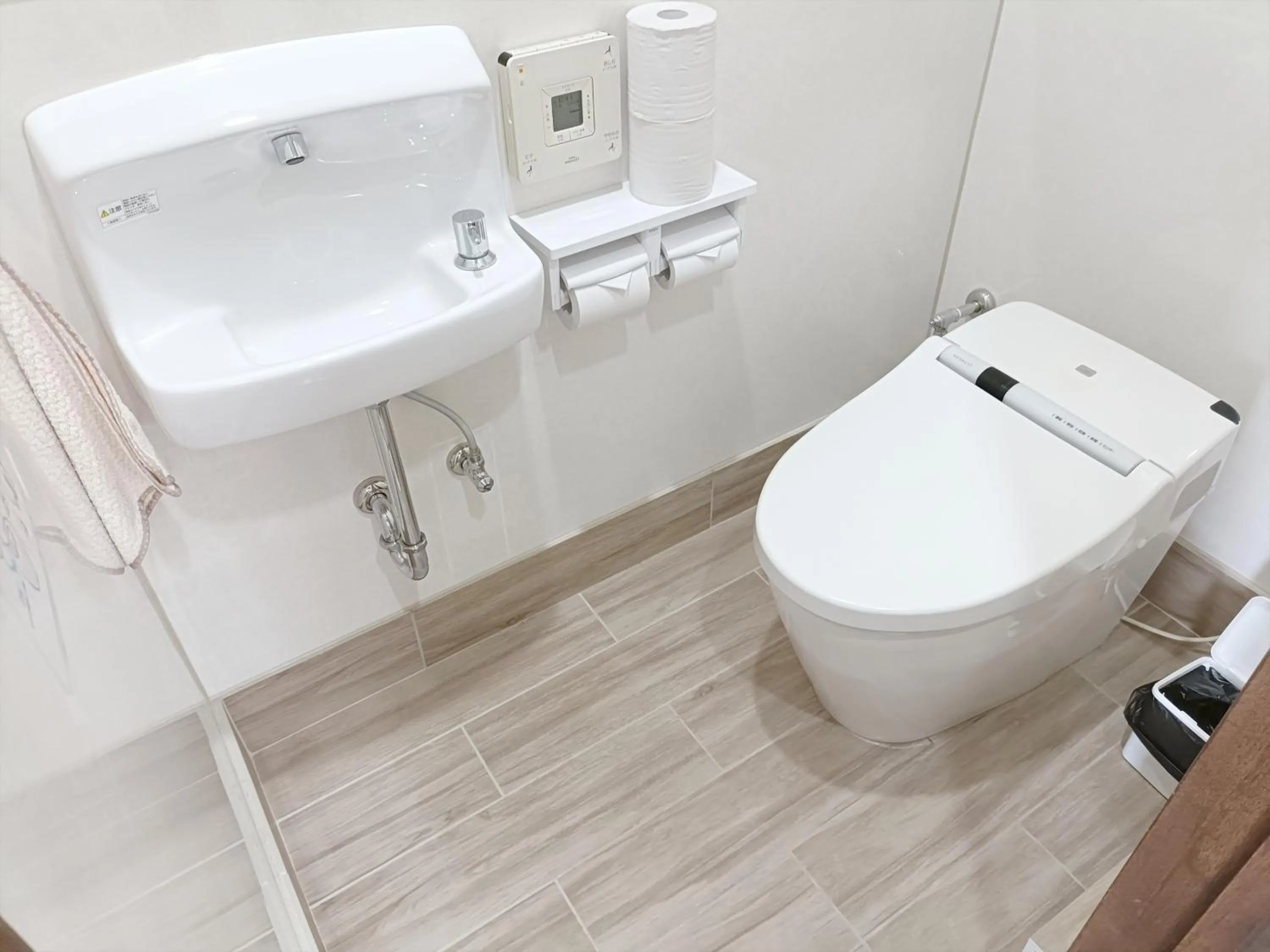 Toilet in Kariyushi Condominium Resort Sea Side House