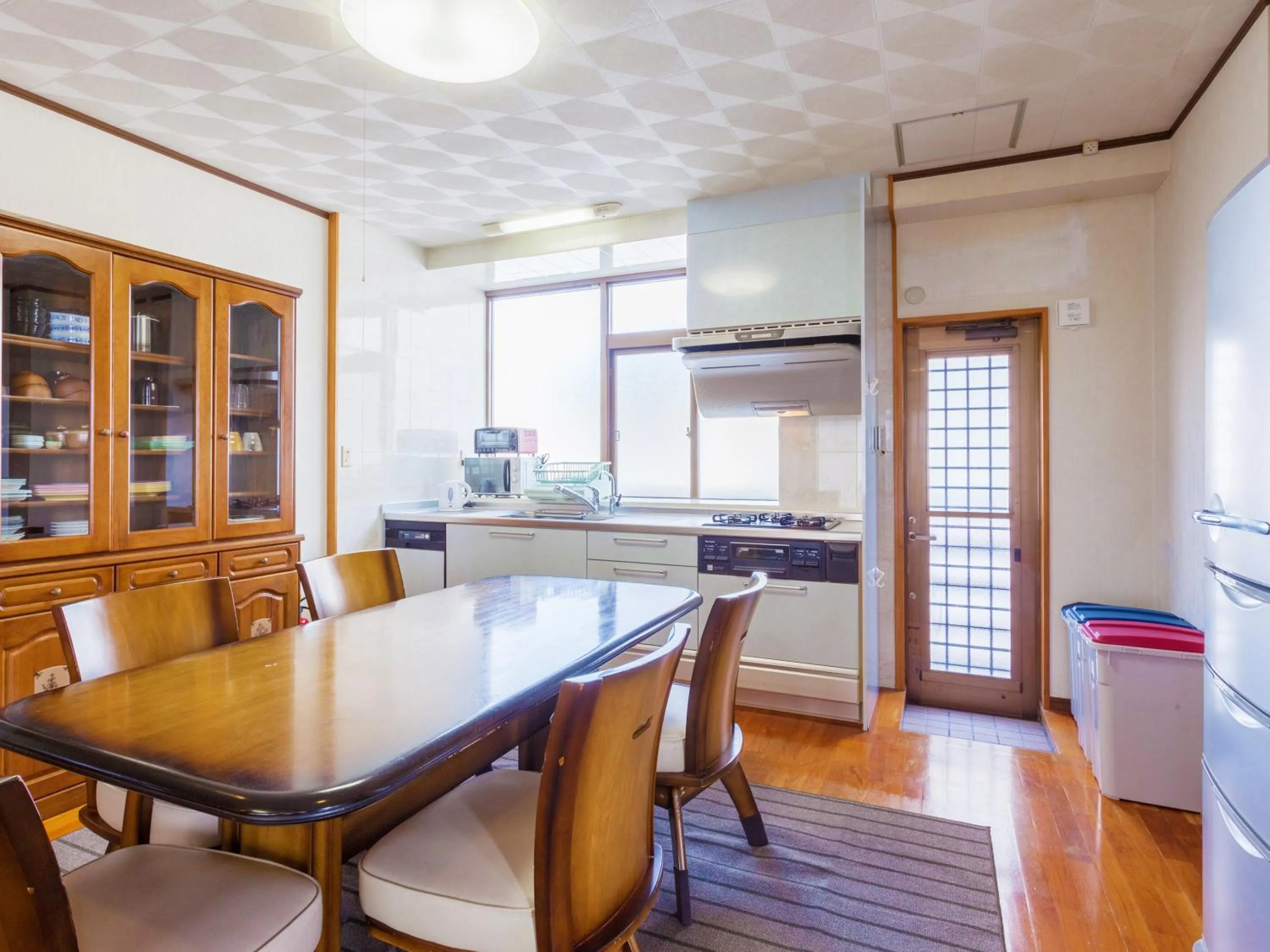 Kitchen or kitchenette in Kariyushi Condominium Resort Sea Side House