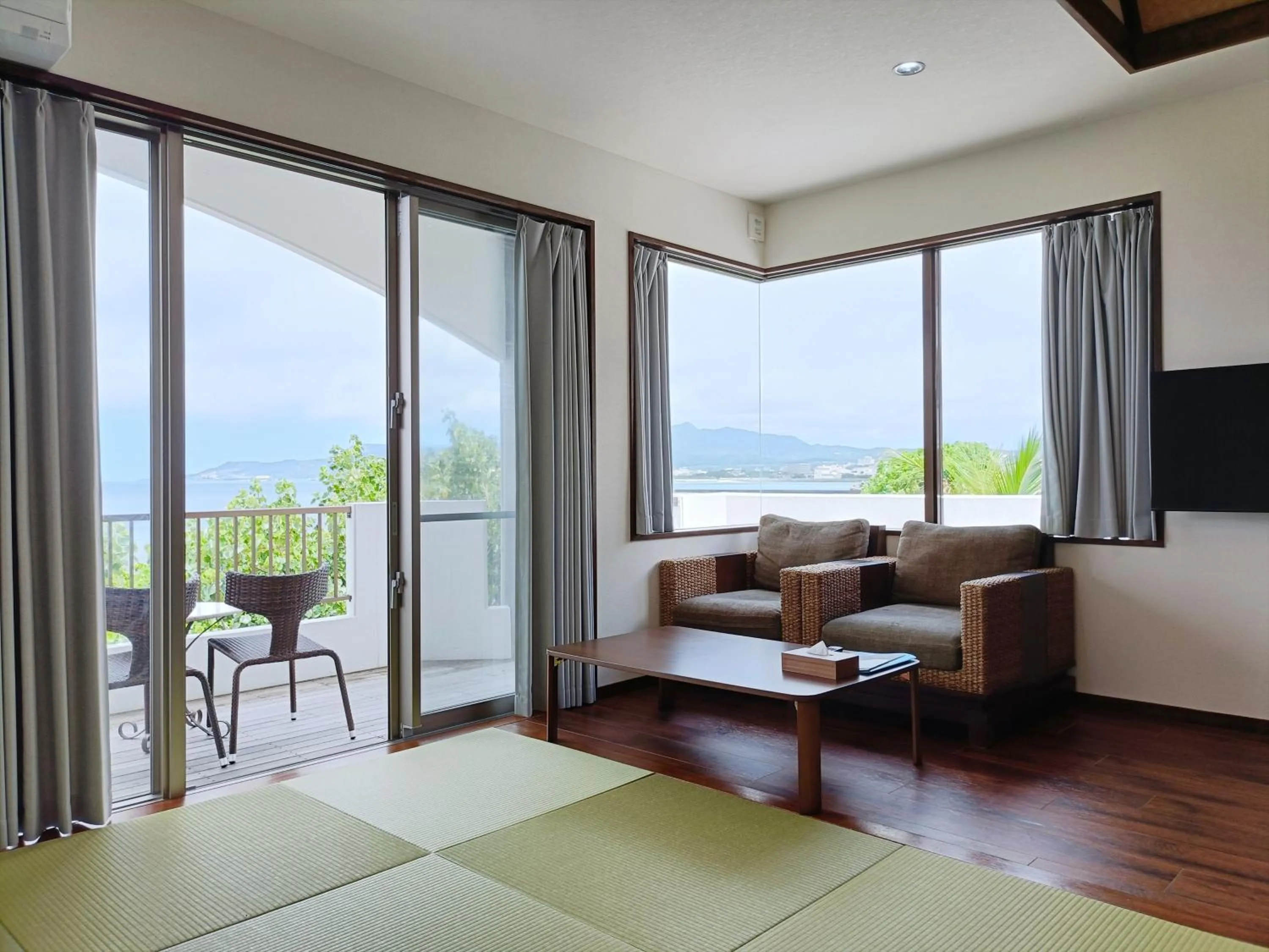 Seating area in Kariyushi Condominium Resort Sea Side House
