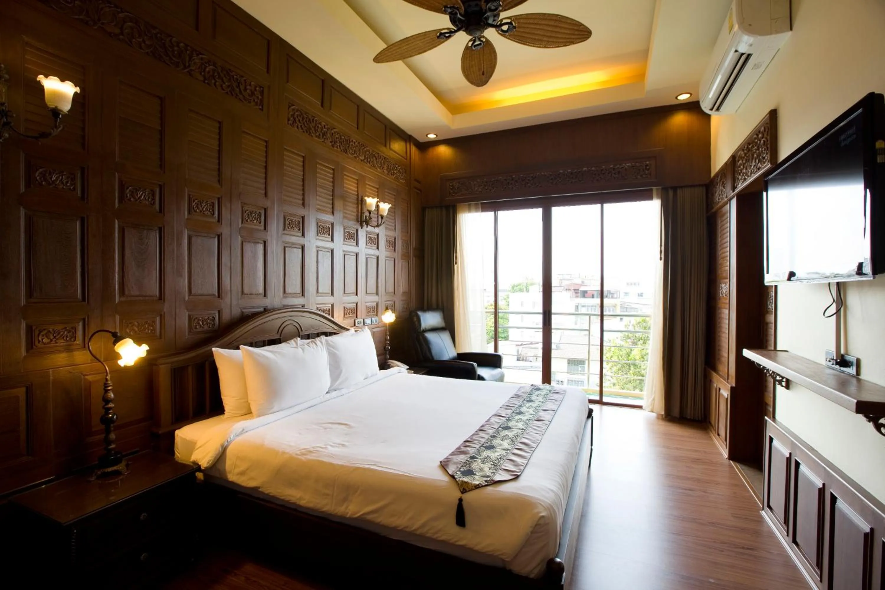 Photo of the whole room, Bed in Lamphu Tree House Boutique Hotel