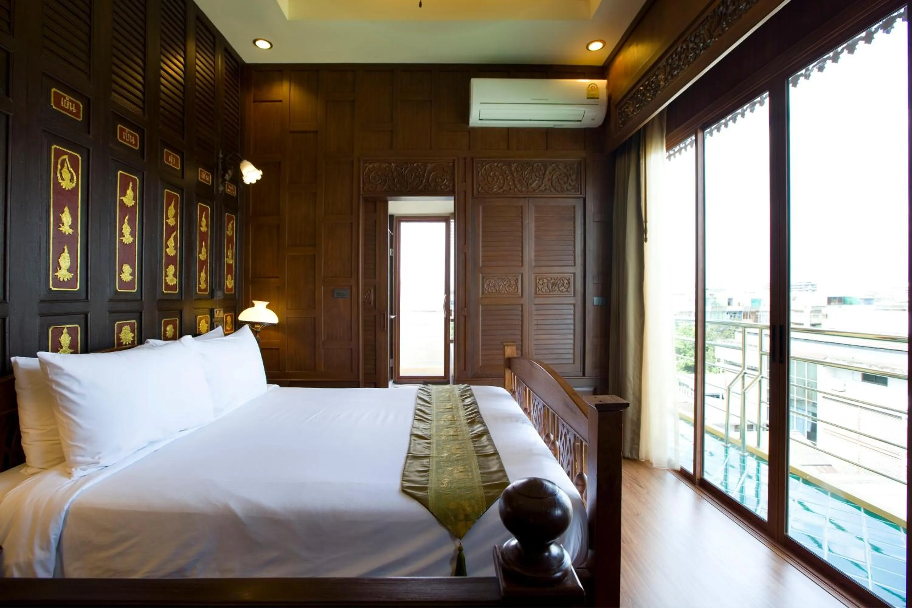 Photo of the whole room, Bed in Lamphu Tree House Boutique Hotel