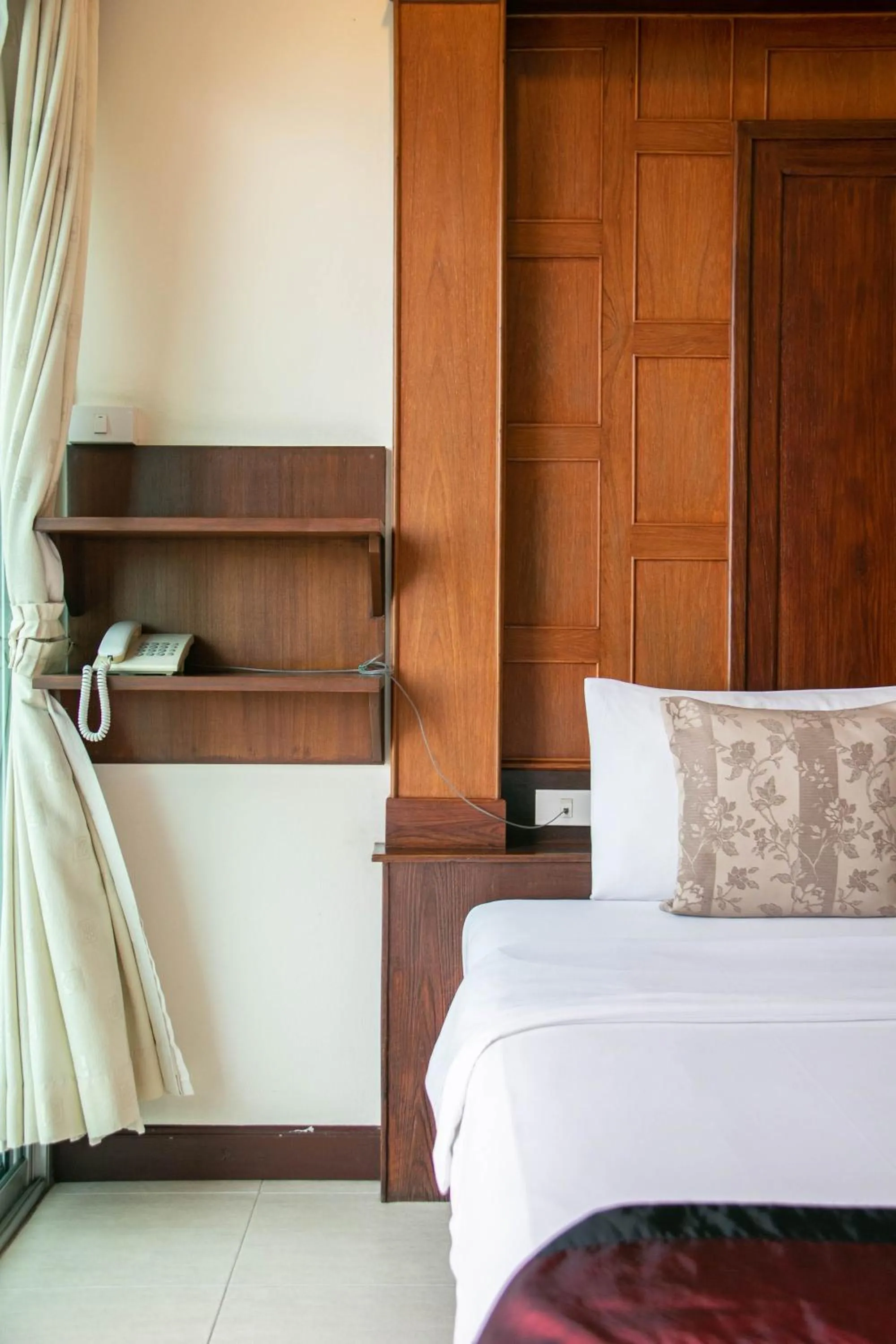 Bed in Lamphu Tree House Boutique Hotel