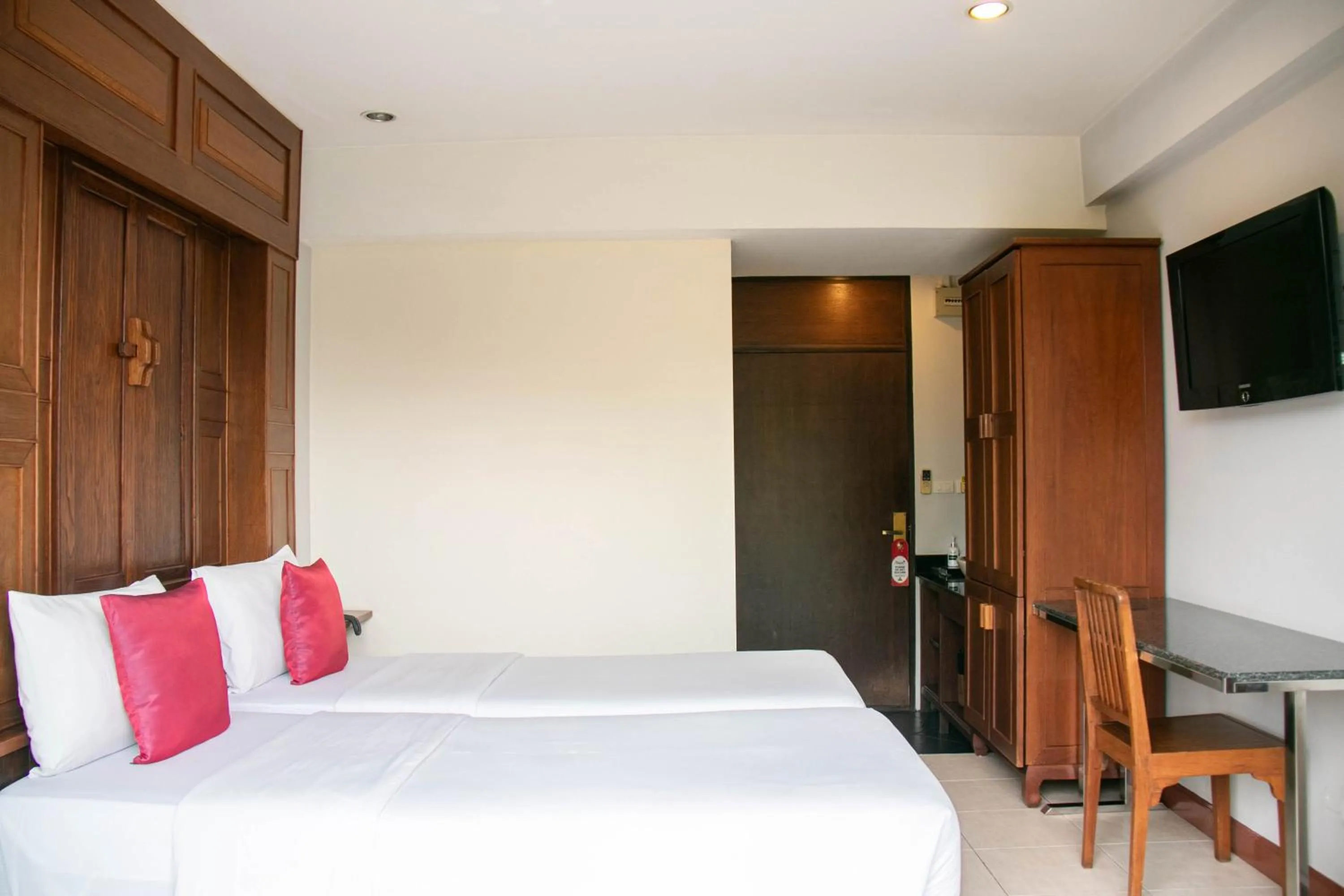 Bed in Lamphu Tree House Boutique Hotel
