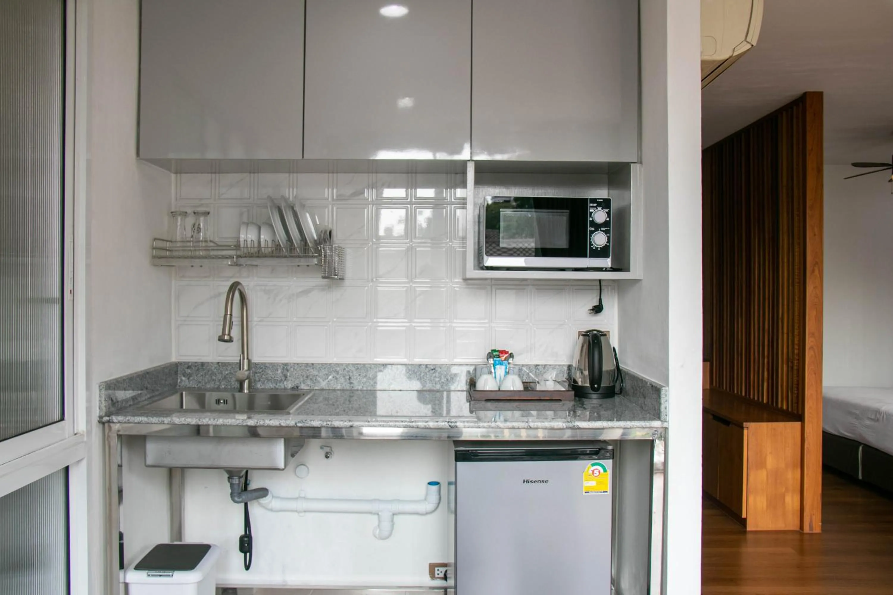 Kitchen or kitchenette in Lamphu Tree House Boutique Hotel