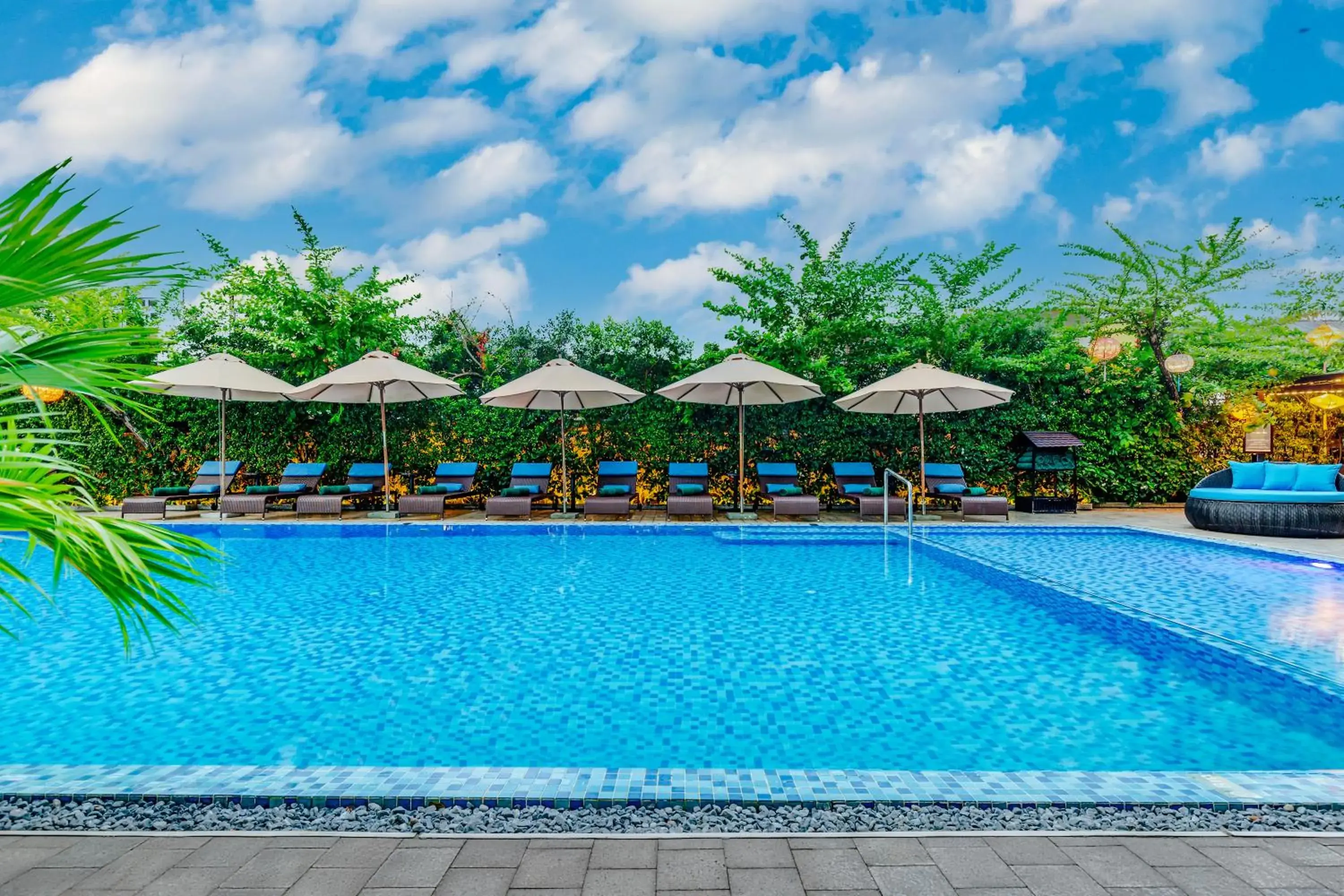 Swimming pool in Wyndham Garden Hoi An Cua Dai Beach Swimming pool in Wyndham Garden Hoi An Cua Dai Beach
