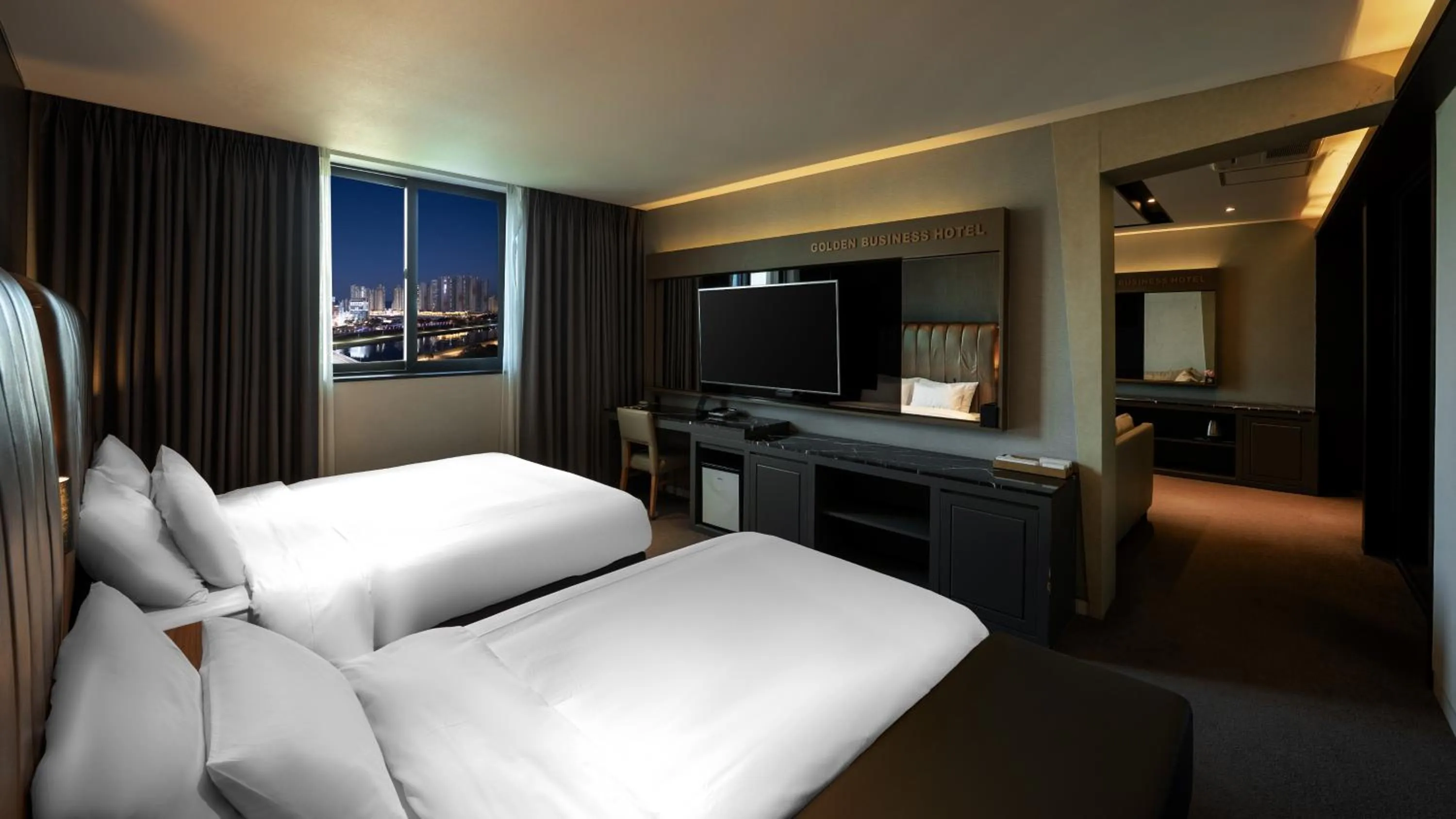 Bed in Golden Business Hotel