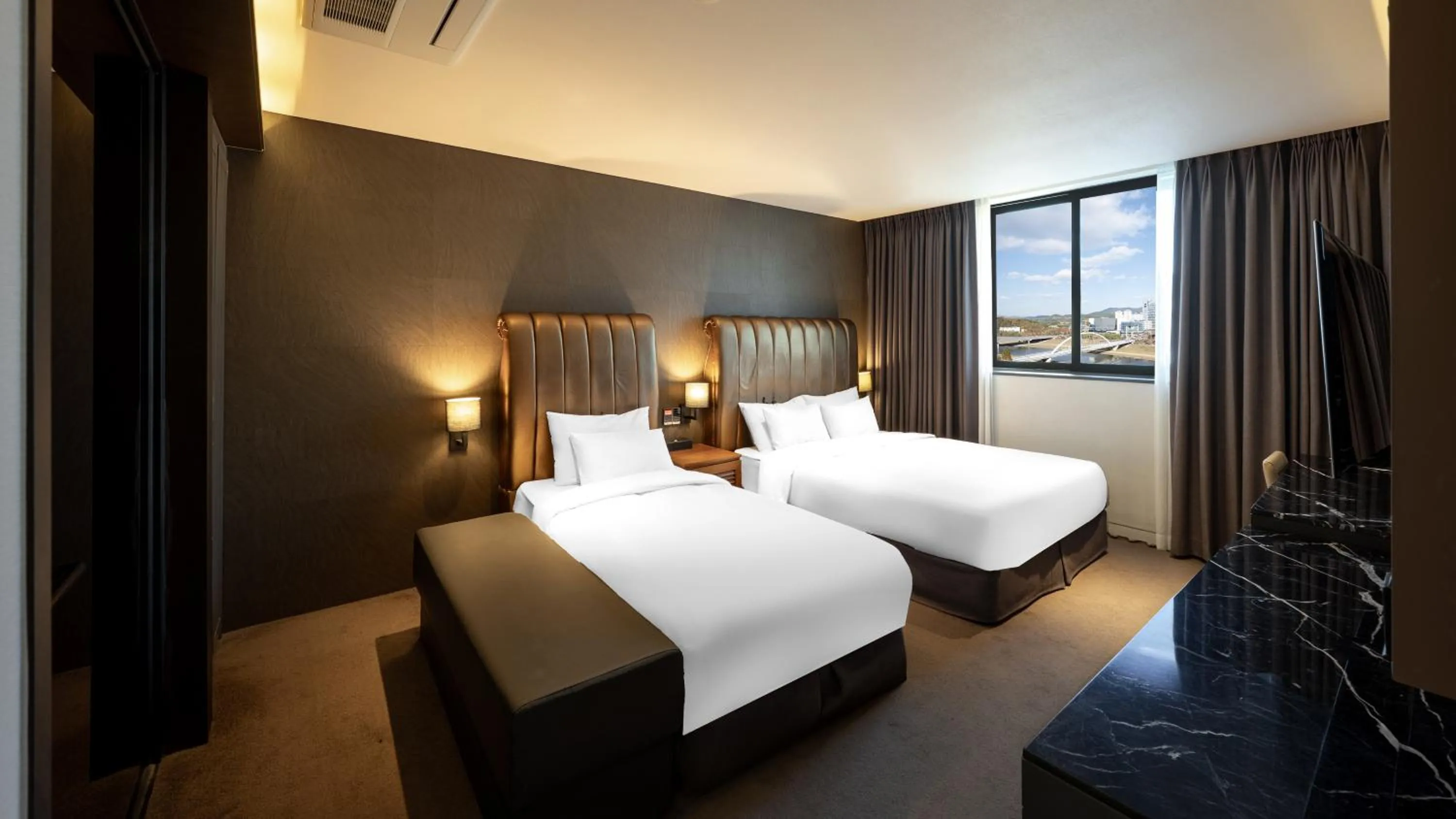 Bed in Golden Business Hotel