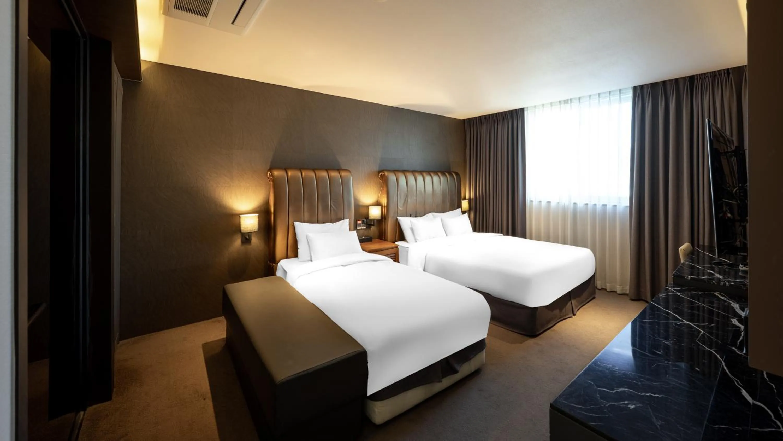 Bed in Golden Business Hotel