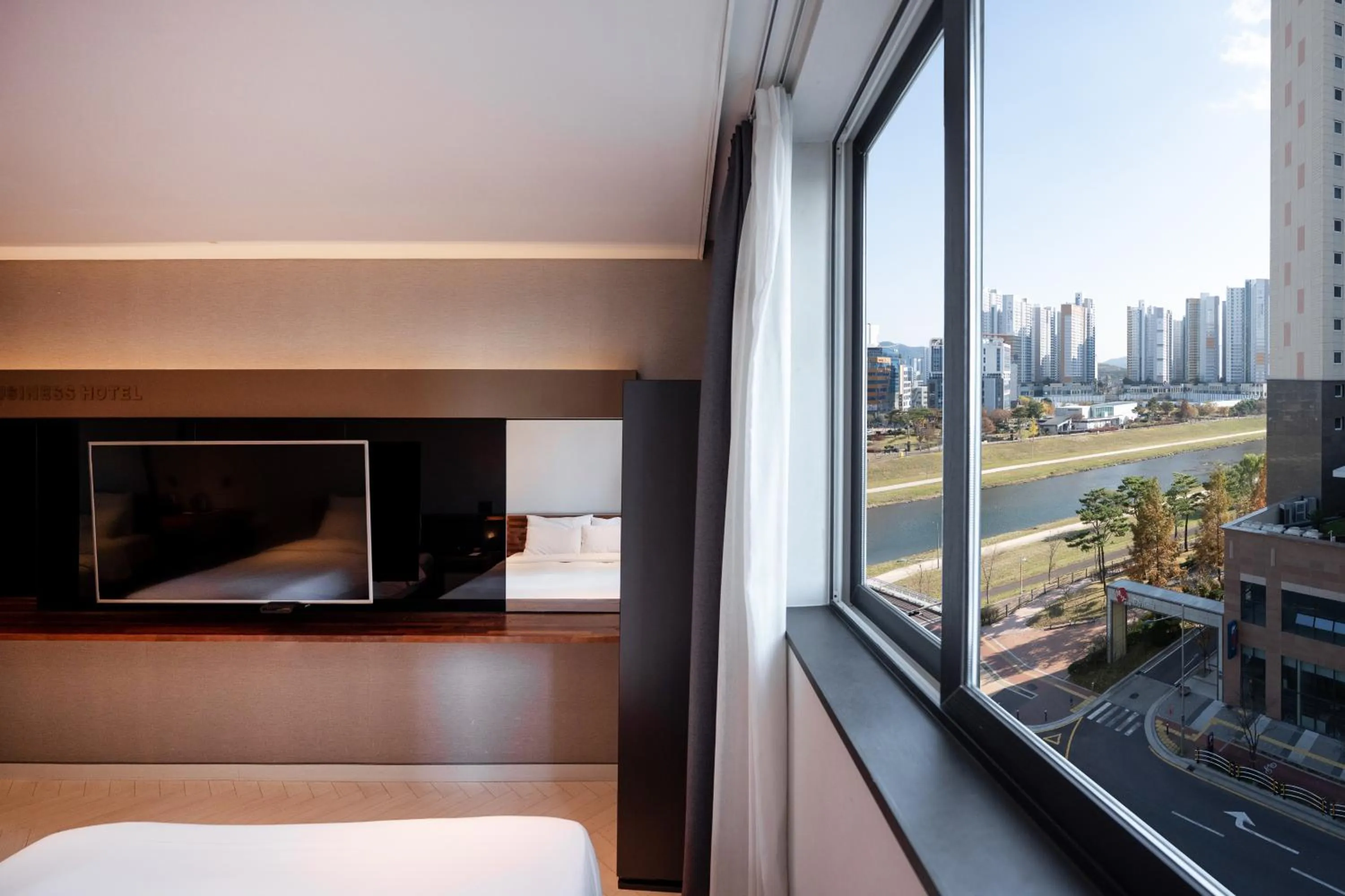 Bed in Golden Business Hotel