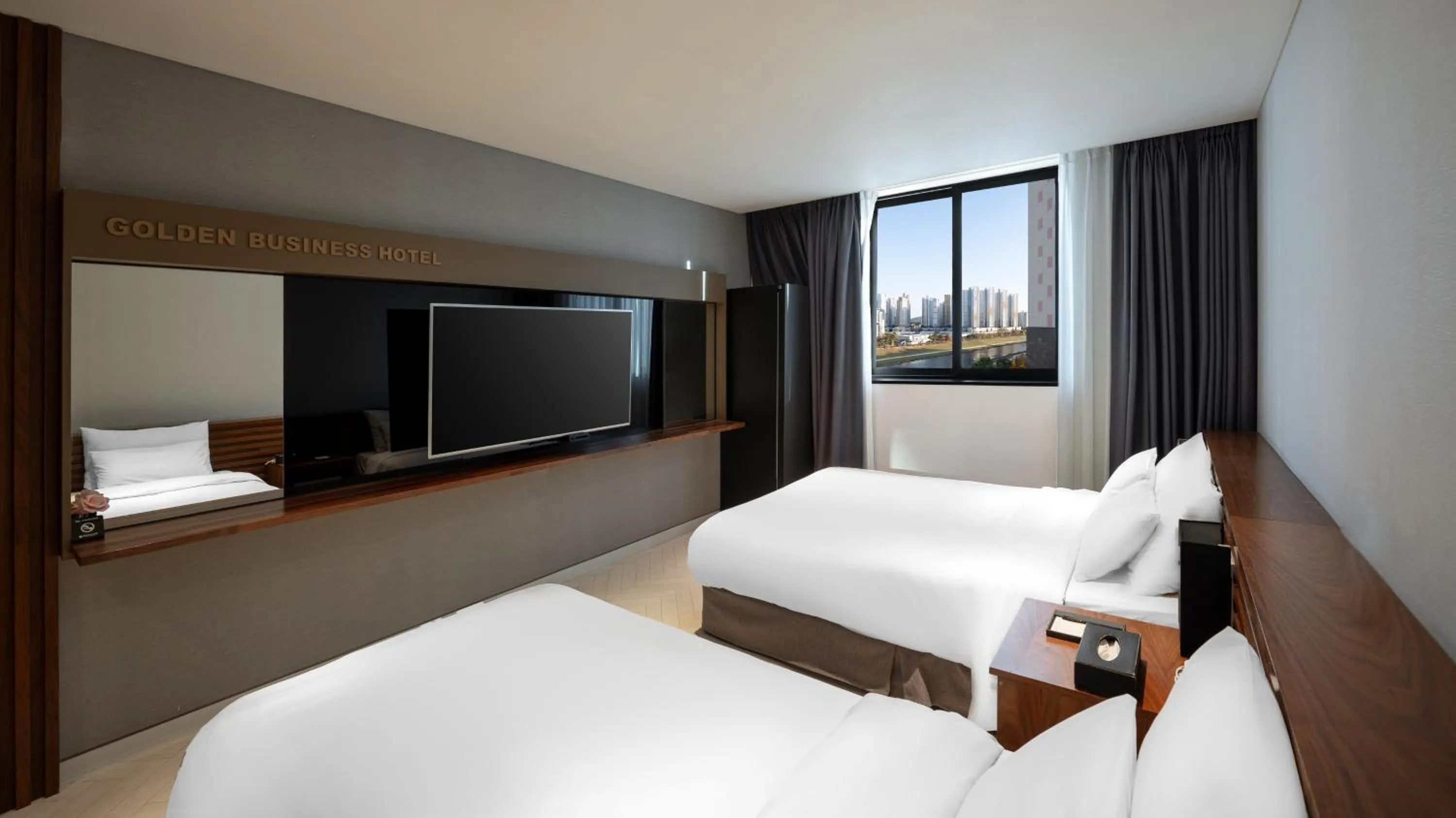 Bed in Golden Business Hotel