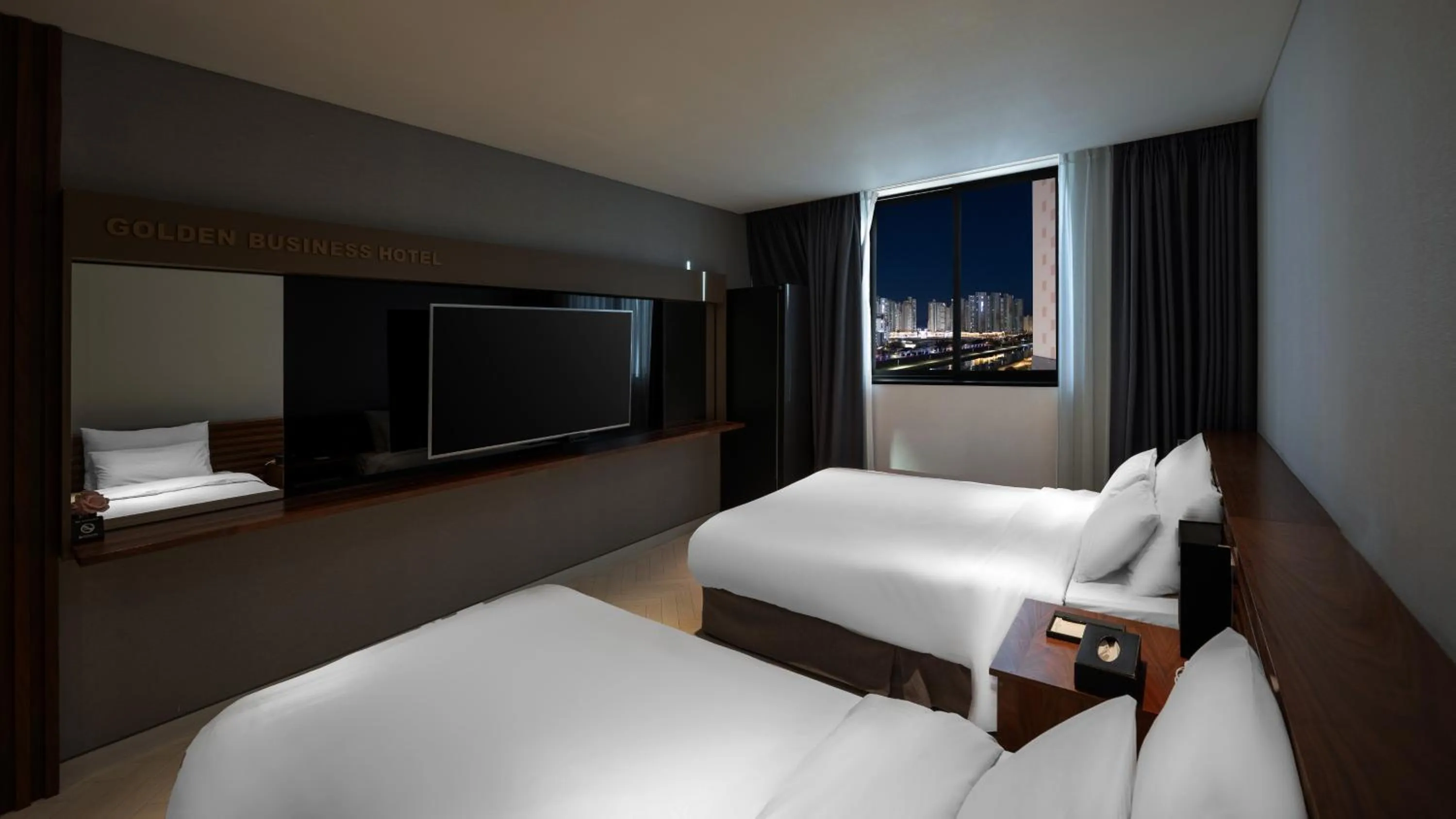 Bed in Golden Business Hotel